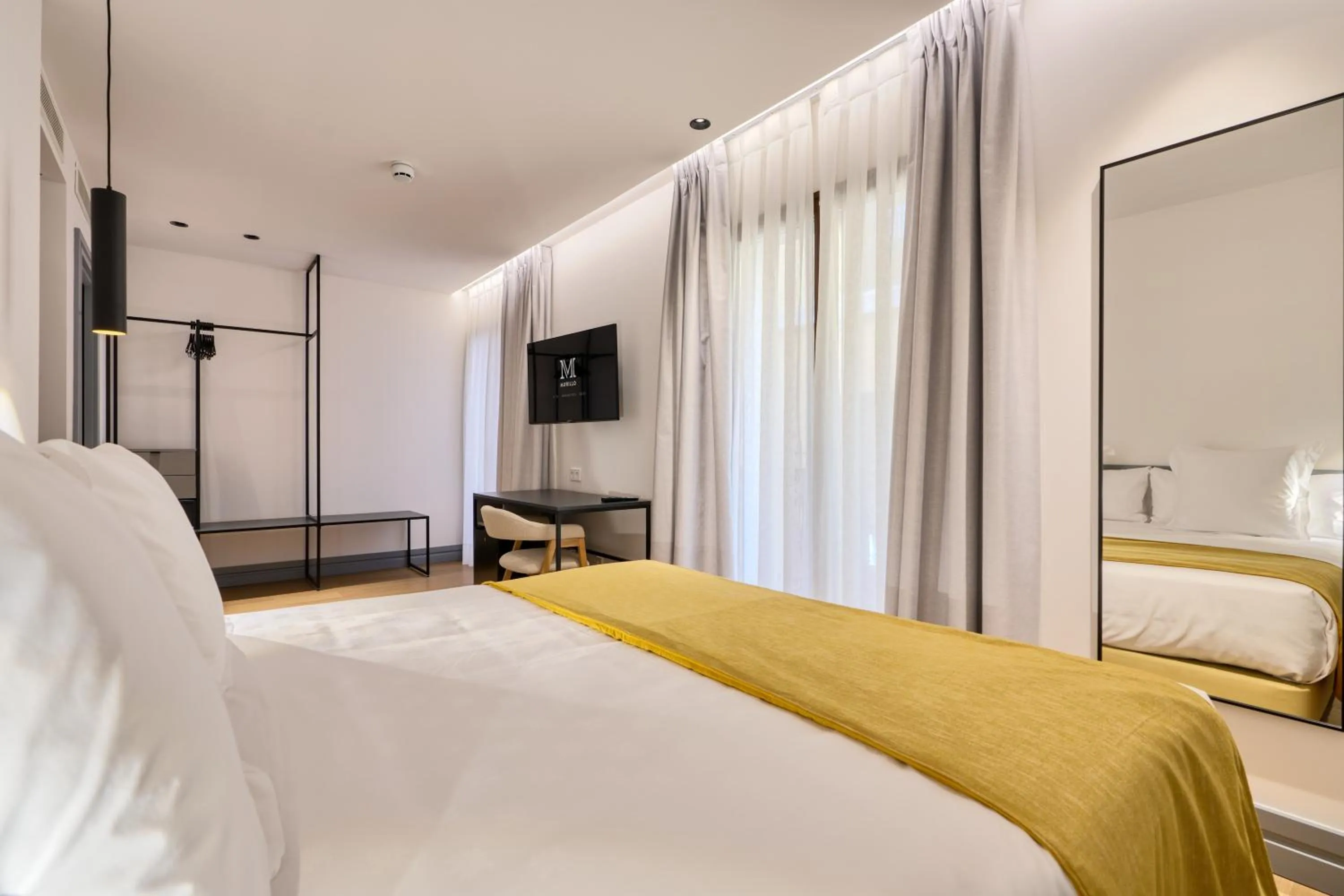 Bed in Hotel Murillo Reinoso