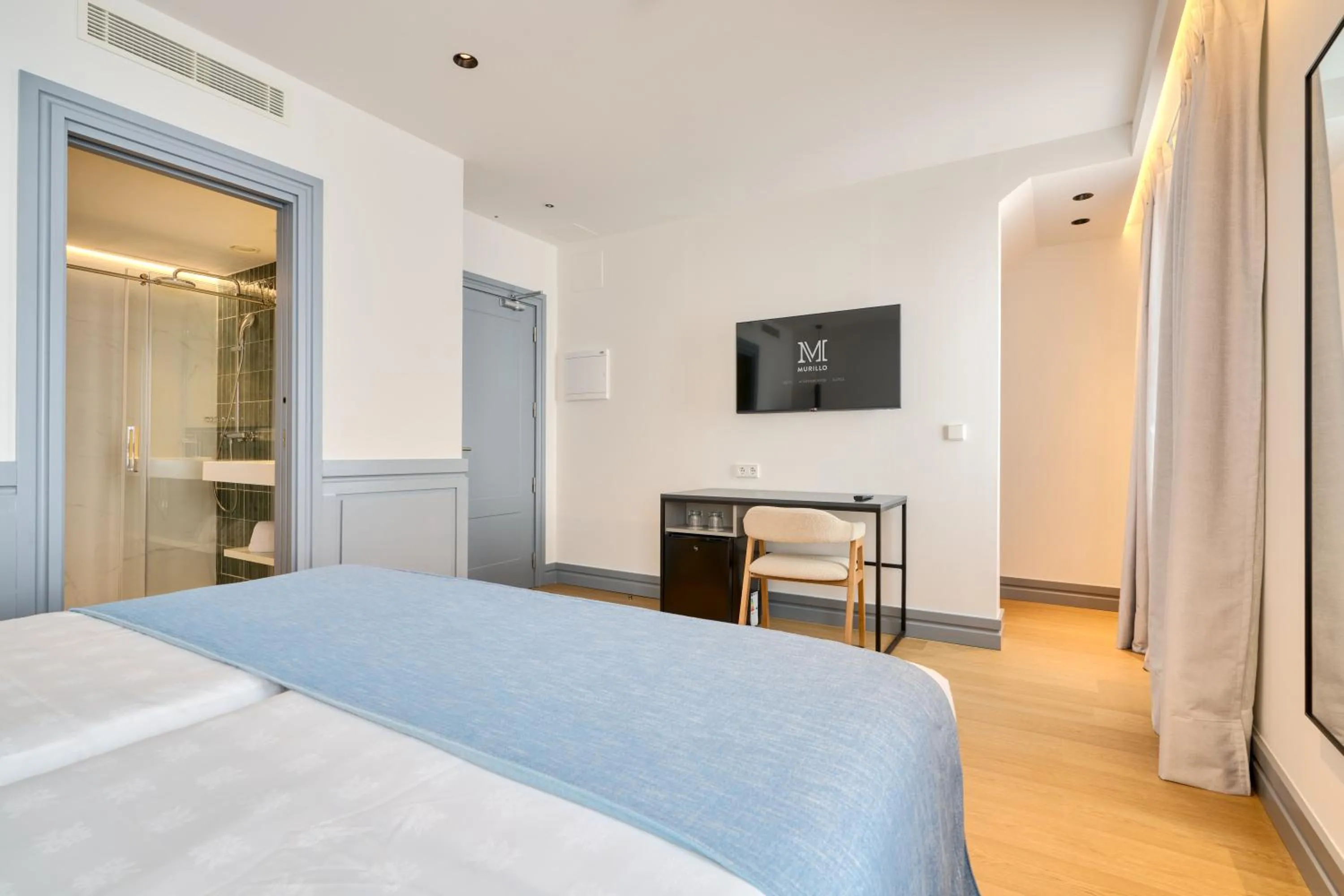 Bed in Hotel Murillo Reinoso