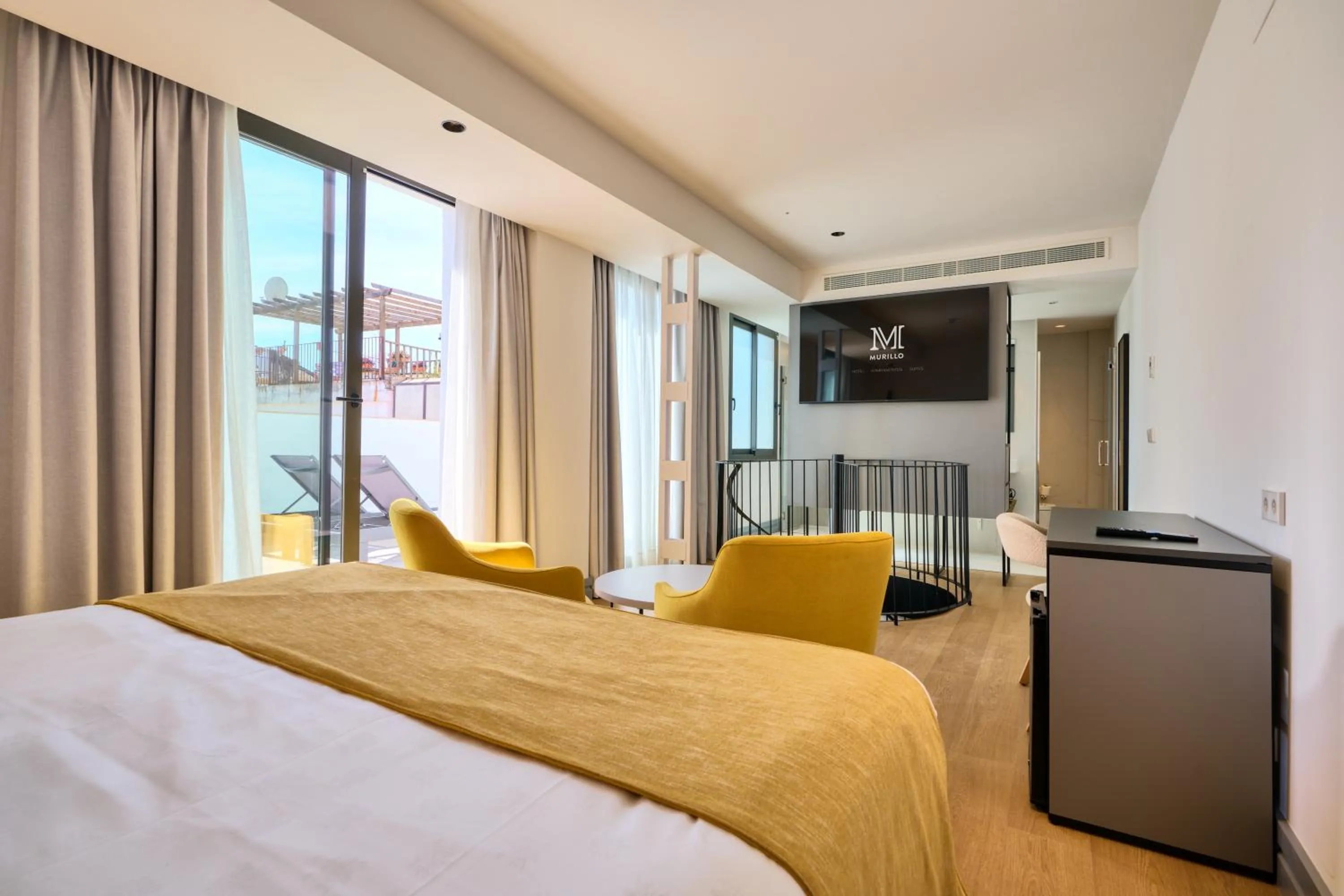 Bed in Hotel Murillo Reinoso