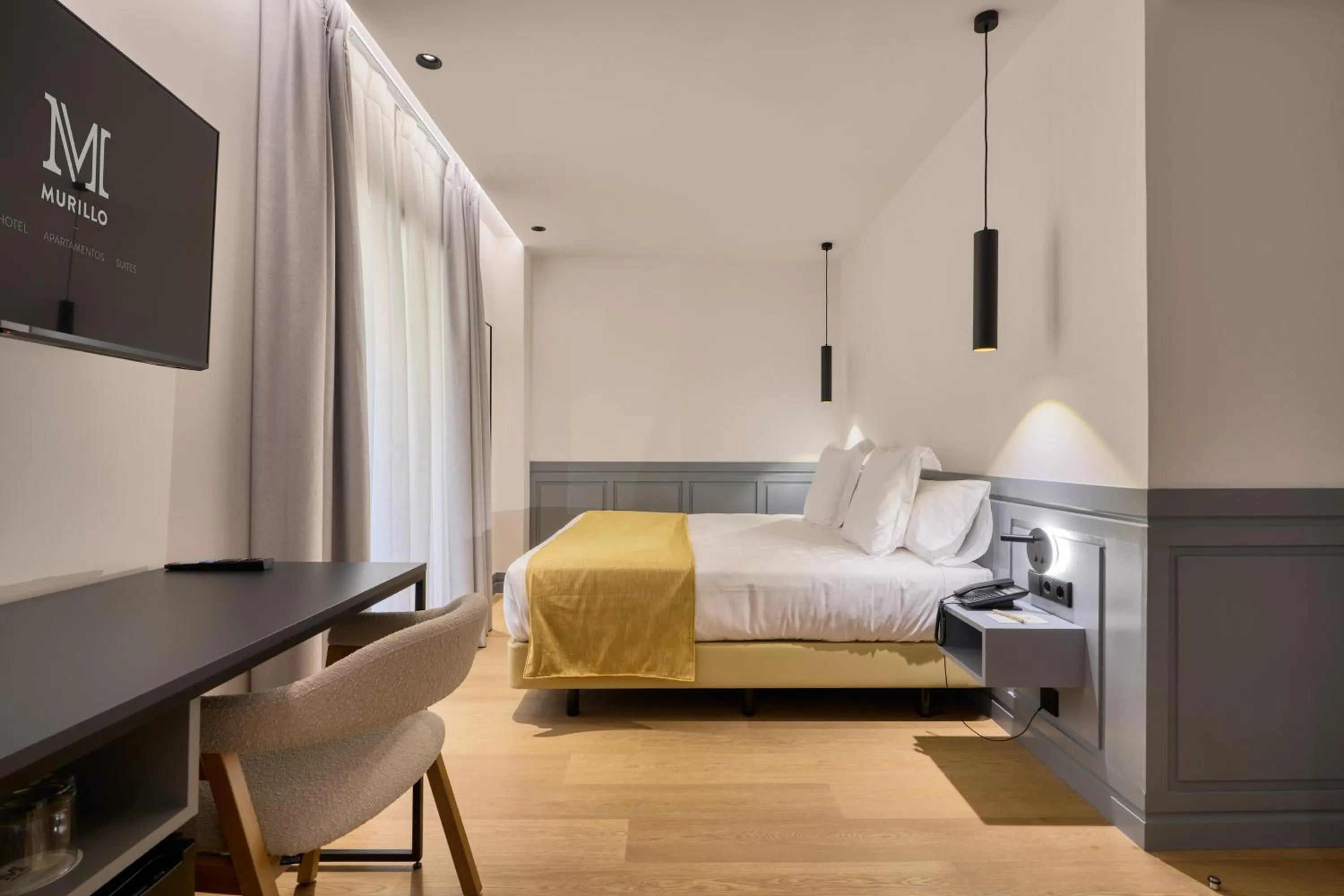 Bed in Hotel Murillo Reinoso