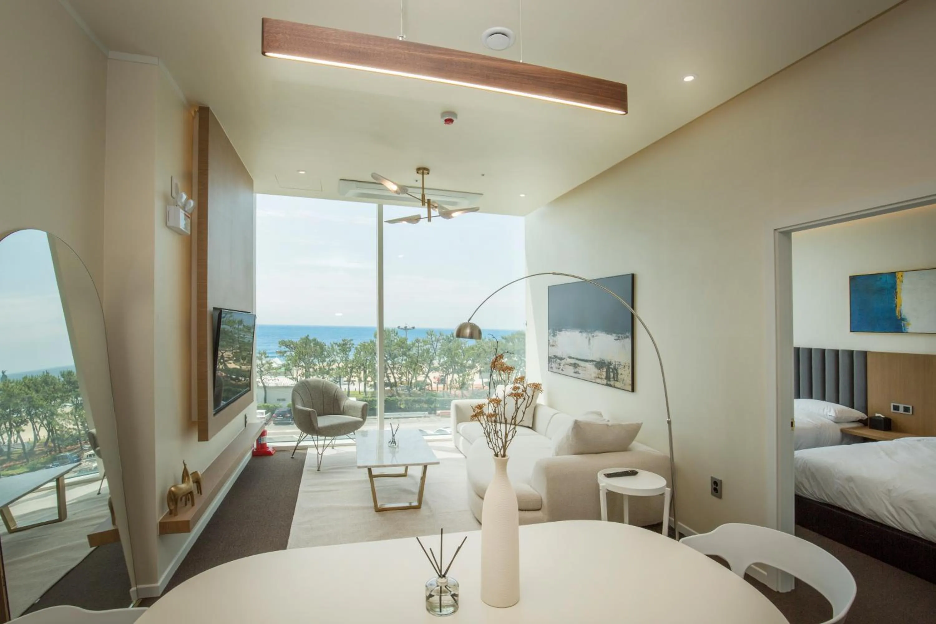 Living room, Bed in UH Suite The Haeundae