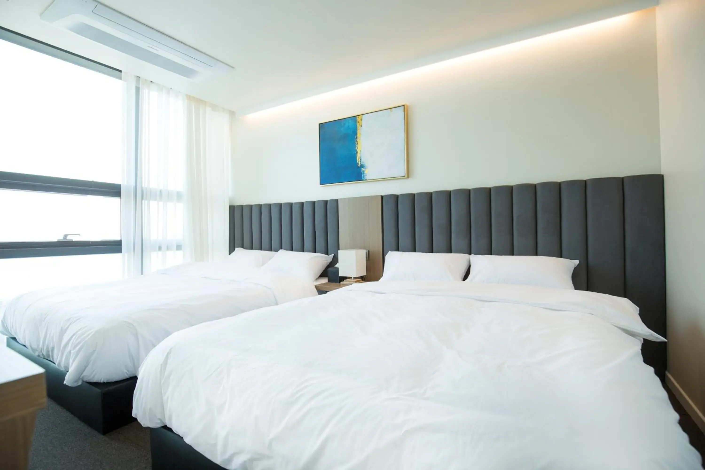 Bed in UH Suite The Haeundae Bed in UH Suite The Haeundae