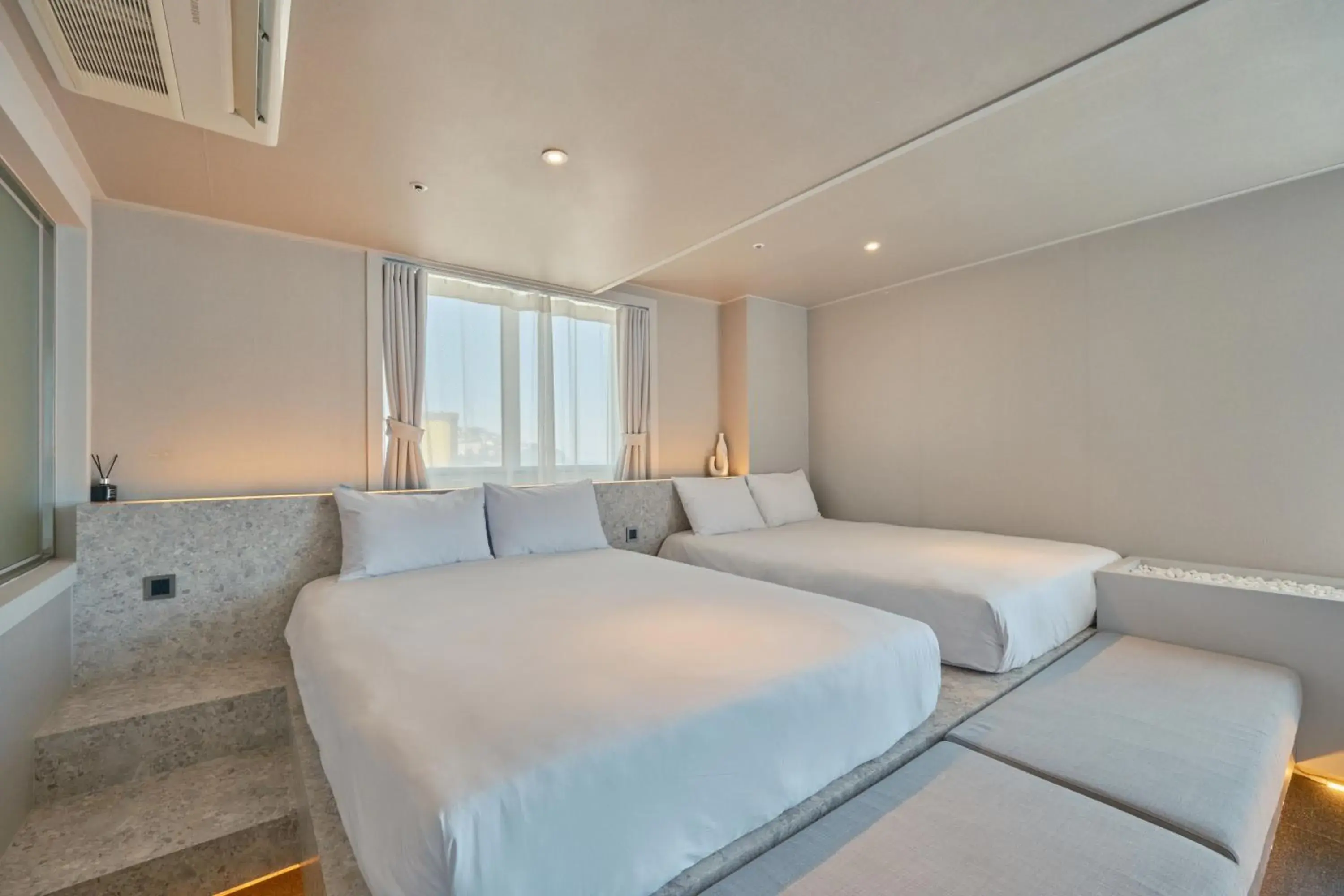 Bed in UH Suite The Haeundae Bed in UH Suite The Haeundae