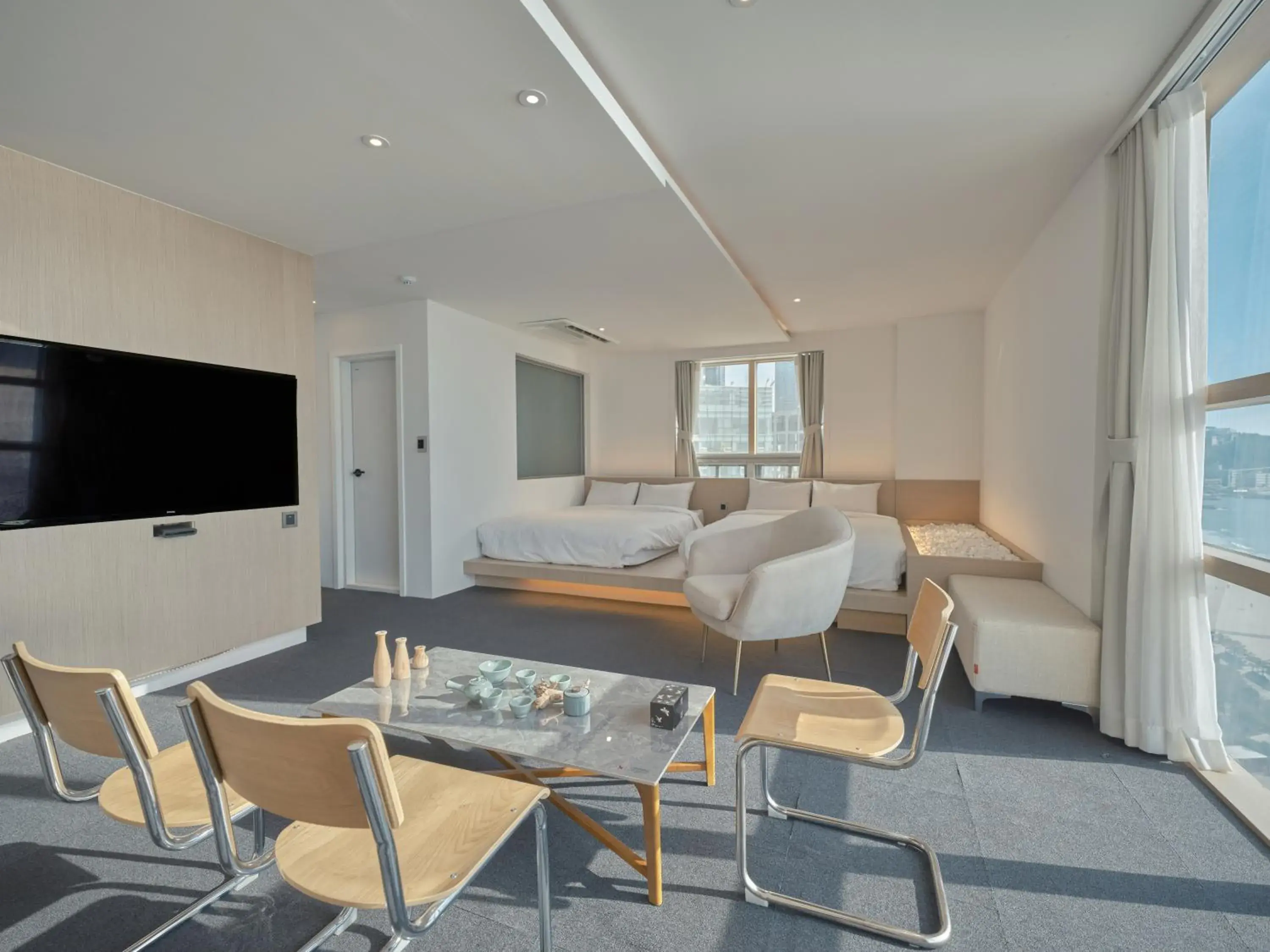 Living room, Bed in UH Suite The Haeundae Living room, Bed in UH Suite The Haeundae