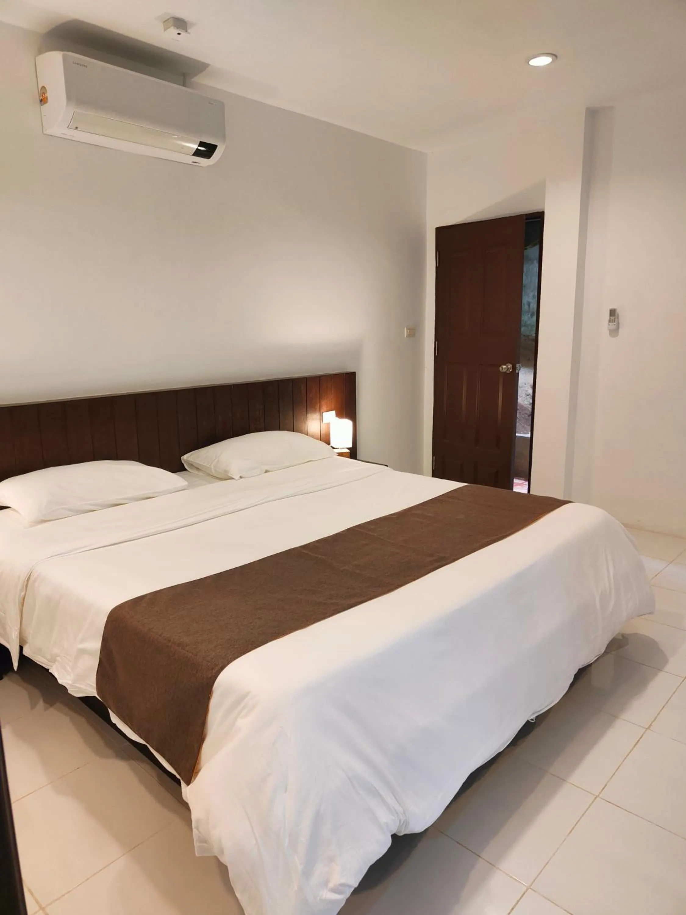 Bed in Phuket Jungle Experience Resort