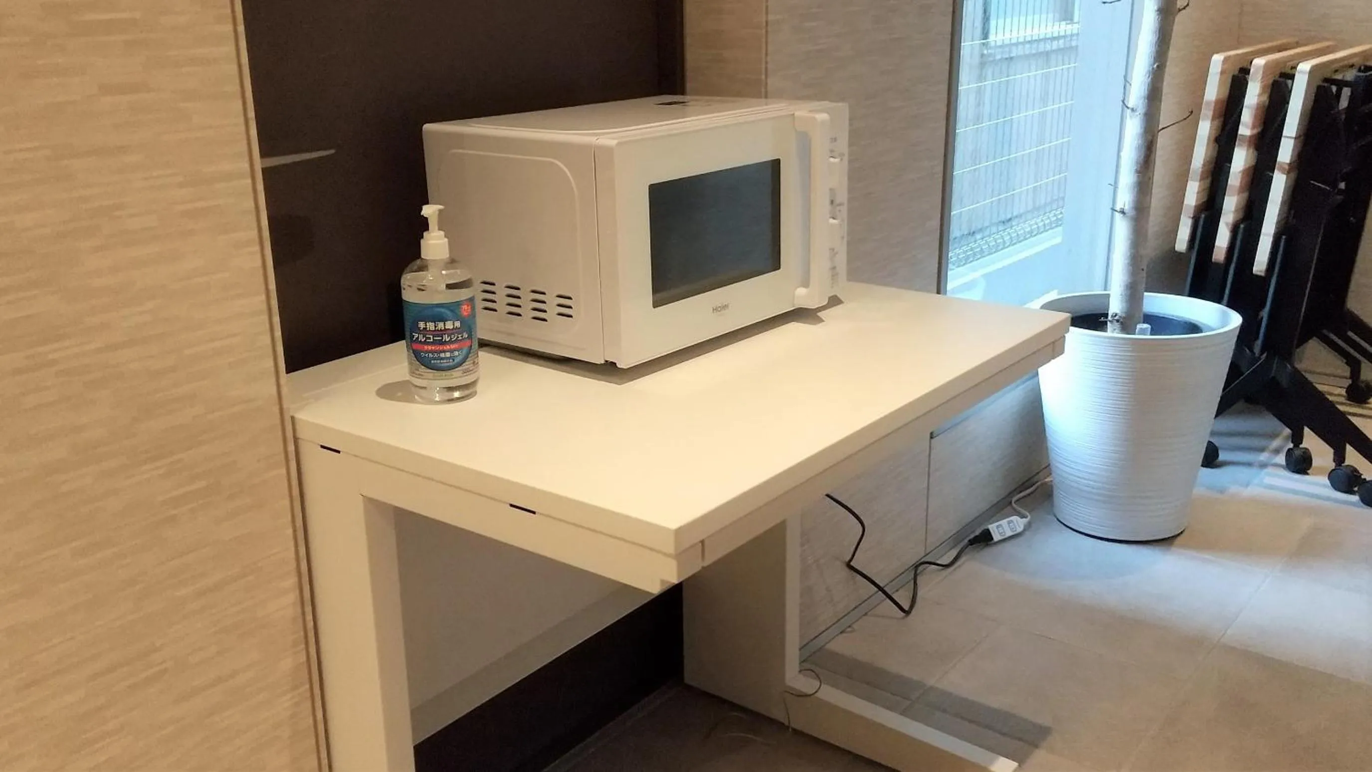 microwave in Hotel Reference Tenjin III
