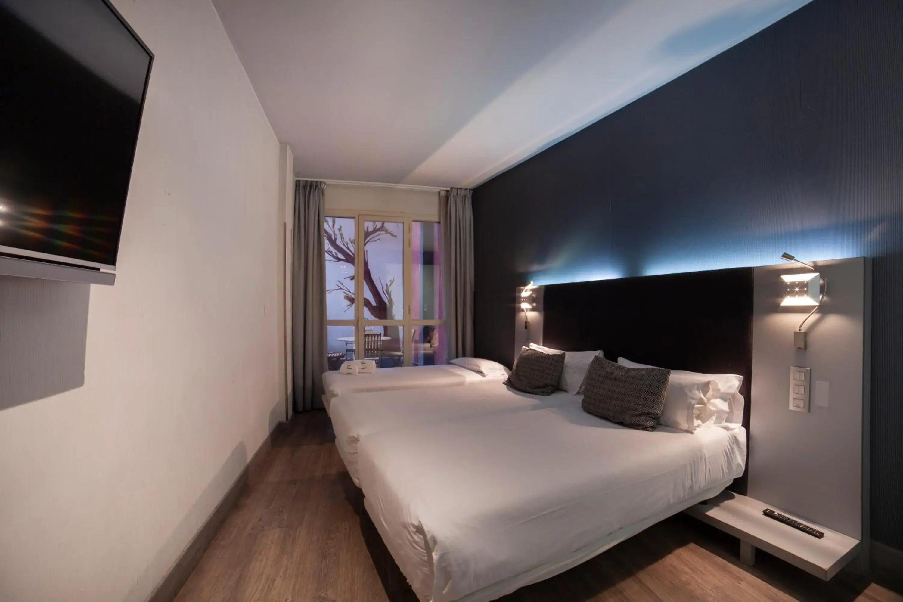 Bed in Petit Palace Plaza España Bed in Petit Palace Plaza España