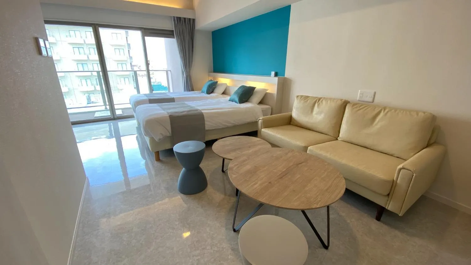 Living room, Bed in Tabinoteitaku Okinawa Naha 2nd