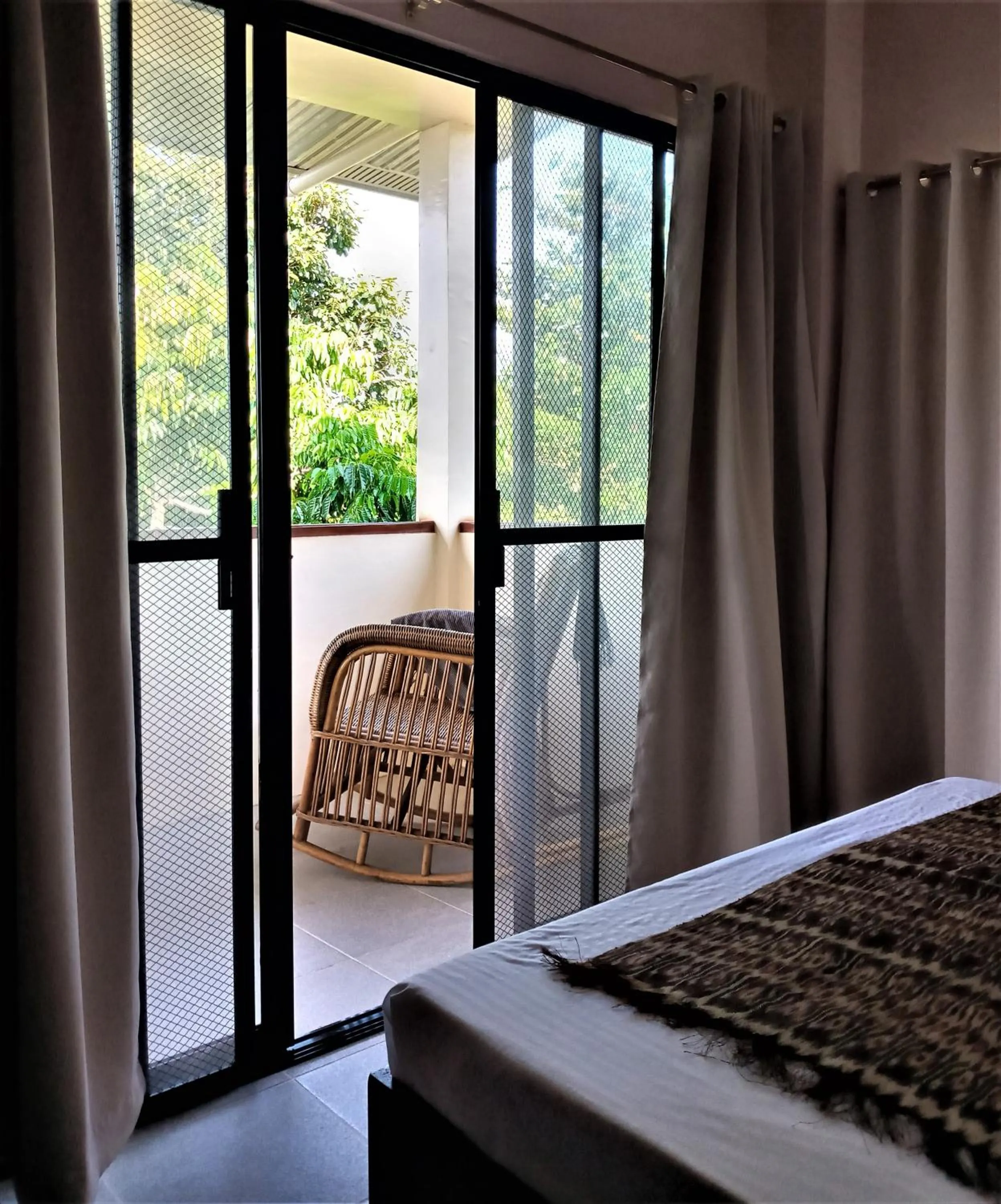 Balcony/Terrace, Bed in The Lazy Tiki