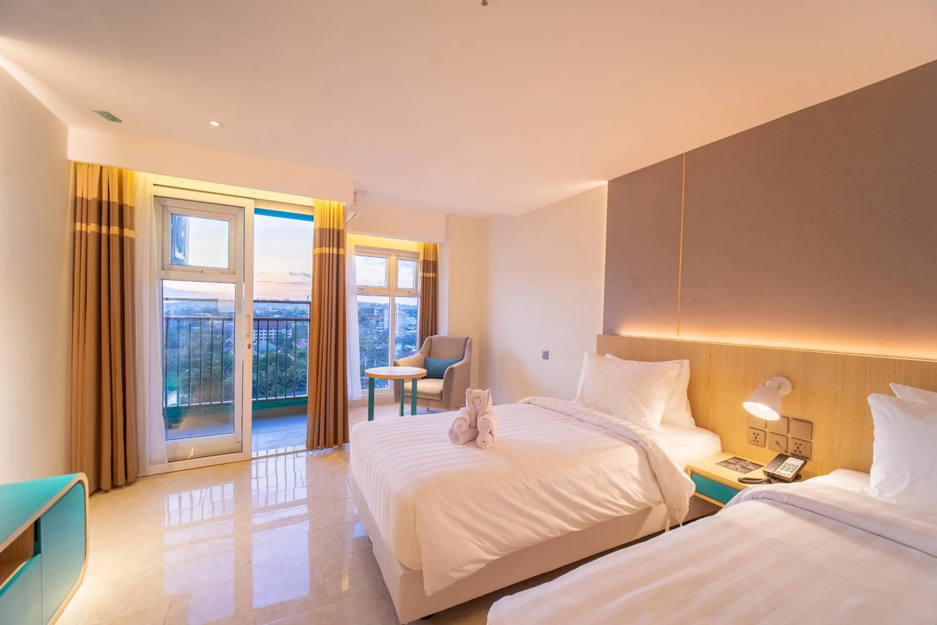 View (from property/room), Bed in Pentacity Hotel Balikpapan