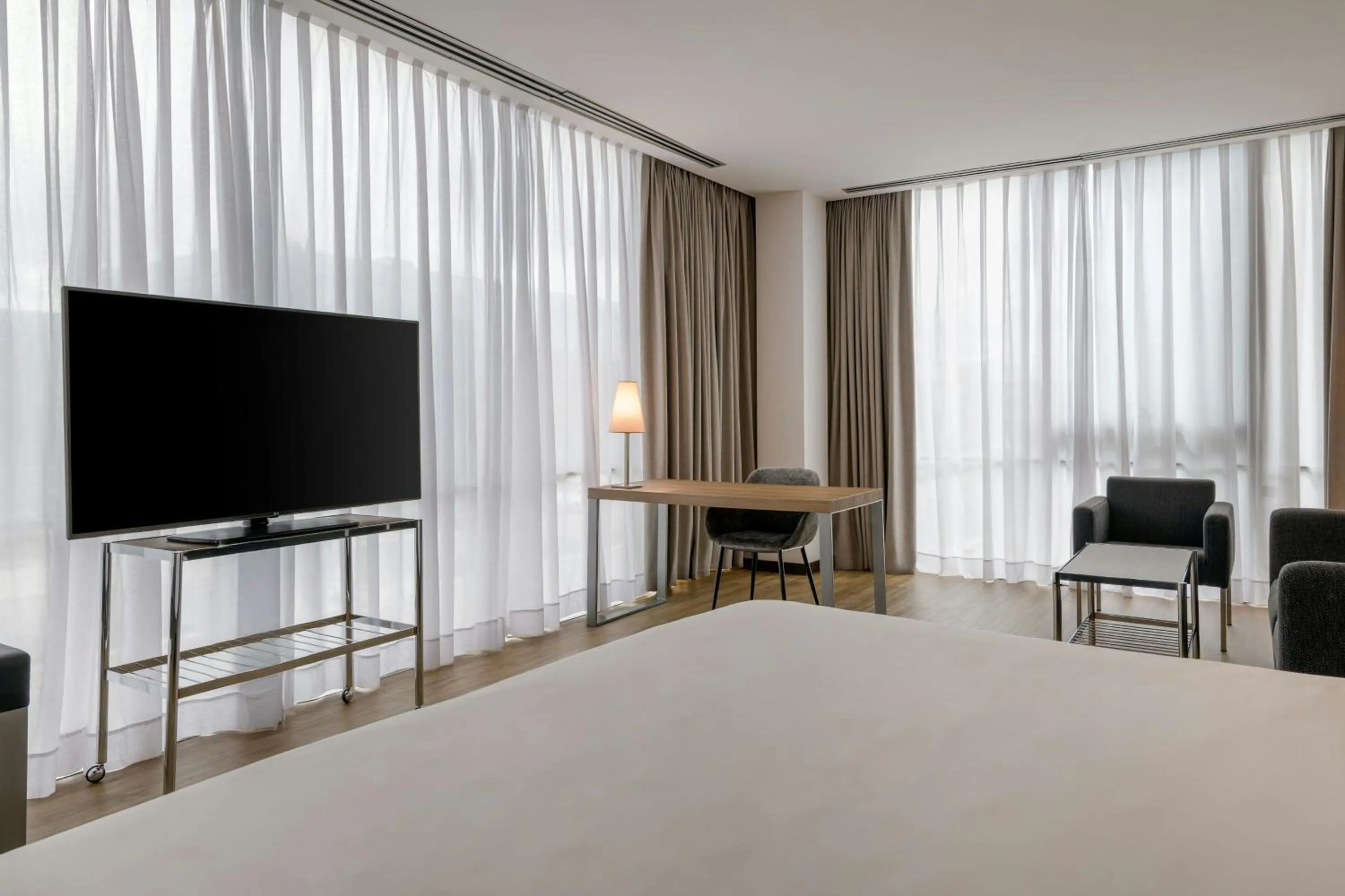 Photo of the whole room, Bed in AC Hotel La Finca by Marriott