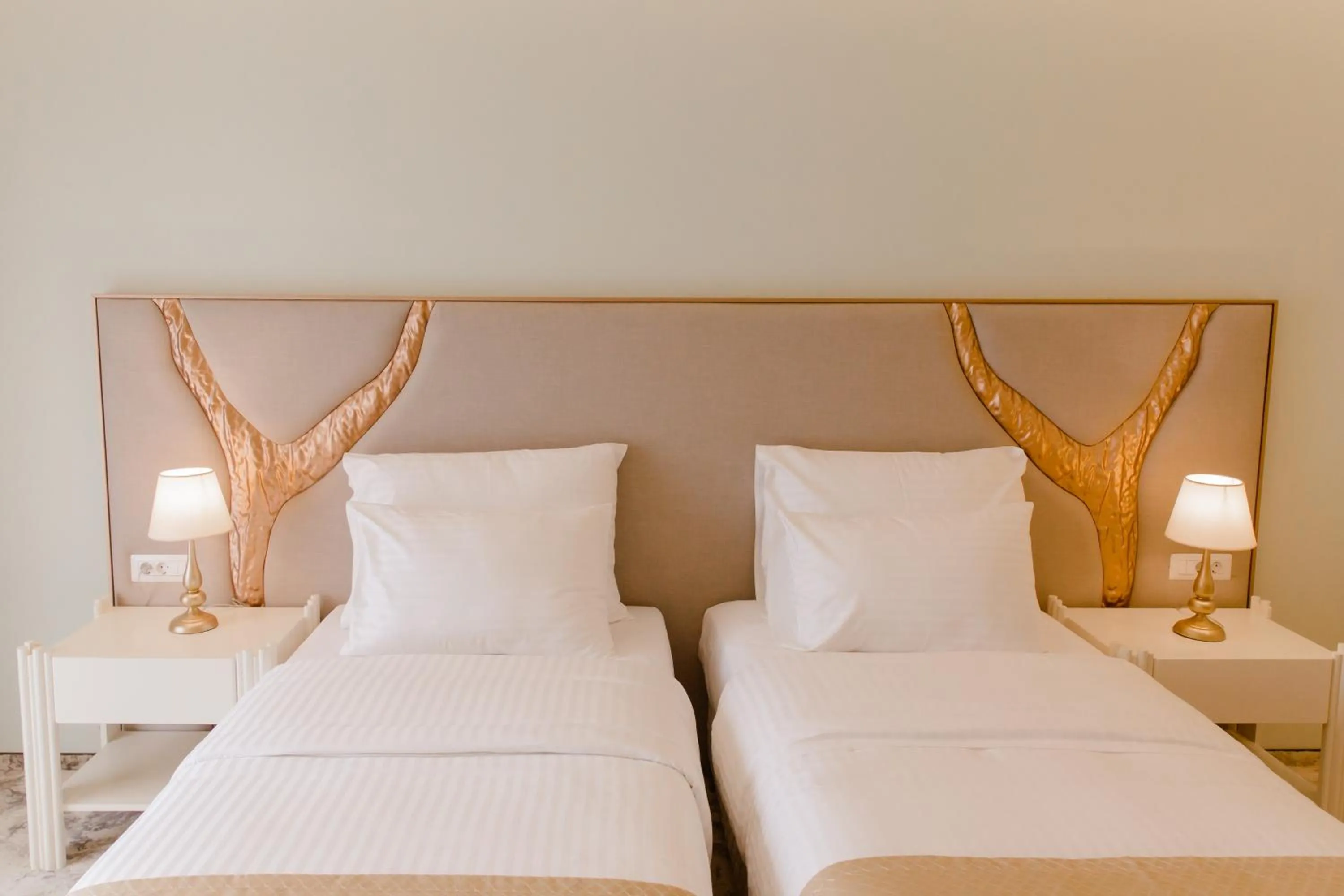 Bed in Muller Hotel Boutique & Spa