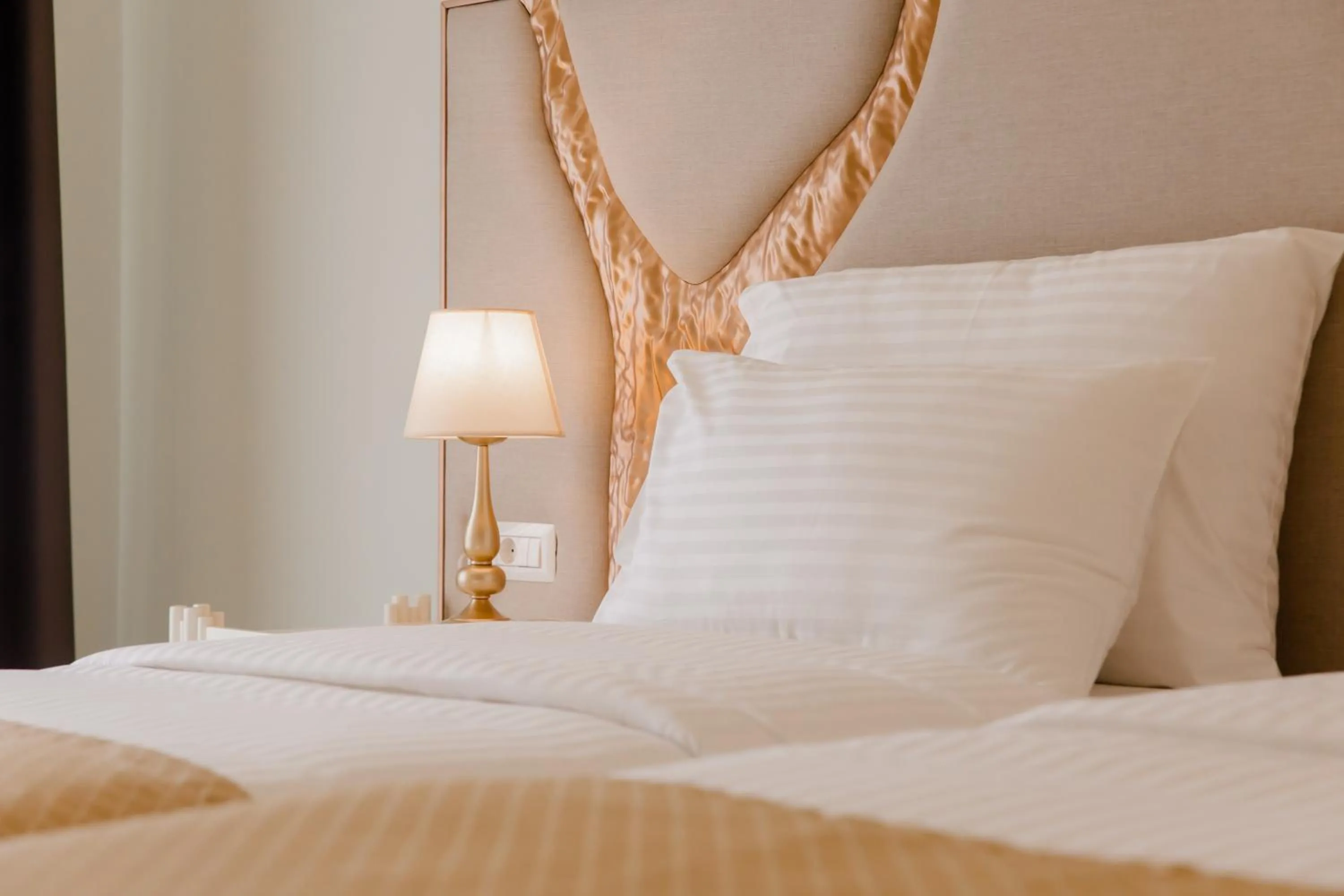 Bed in Muller Hotel Boutique & Spa