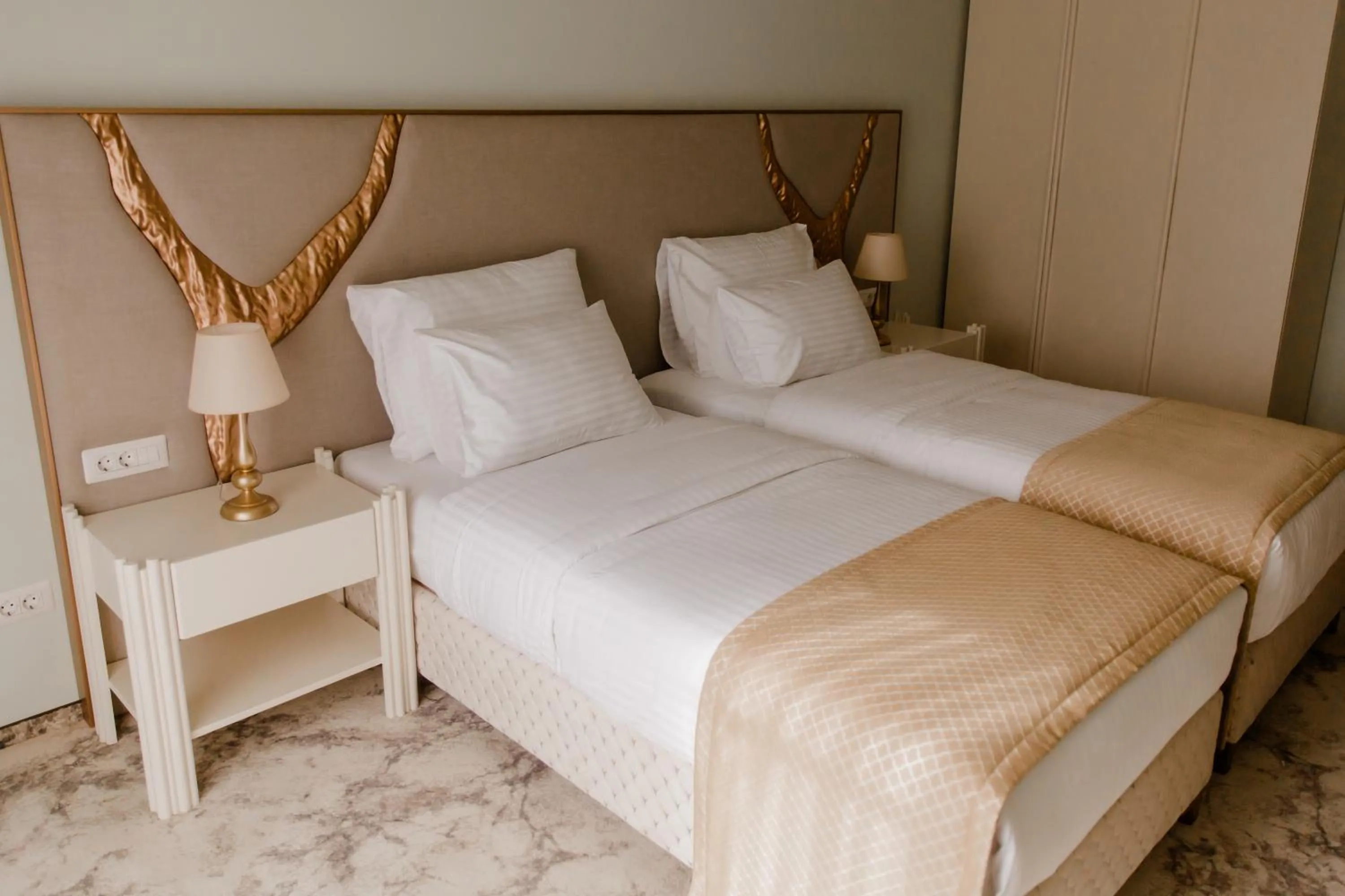 Bed in Muller Hotel Boutique & Spa