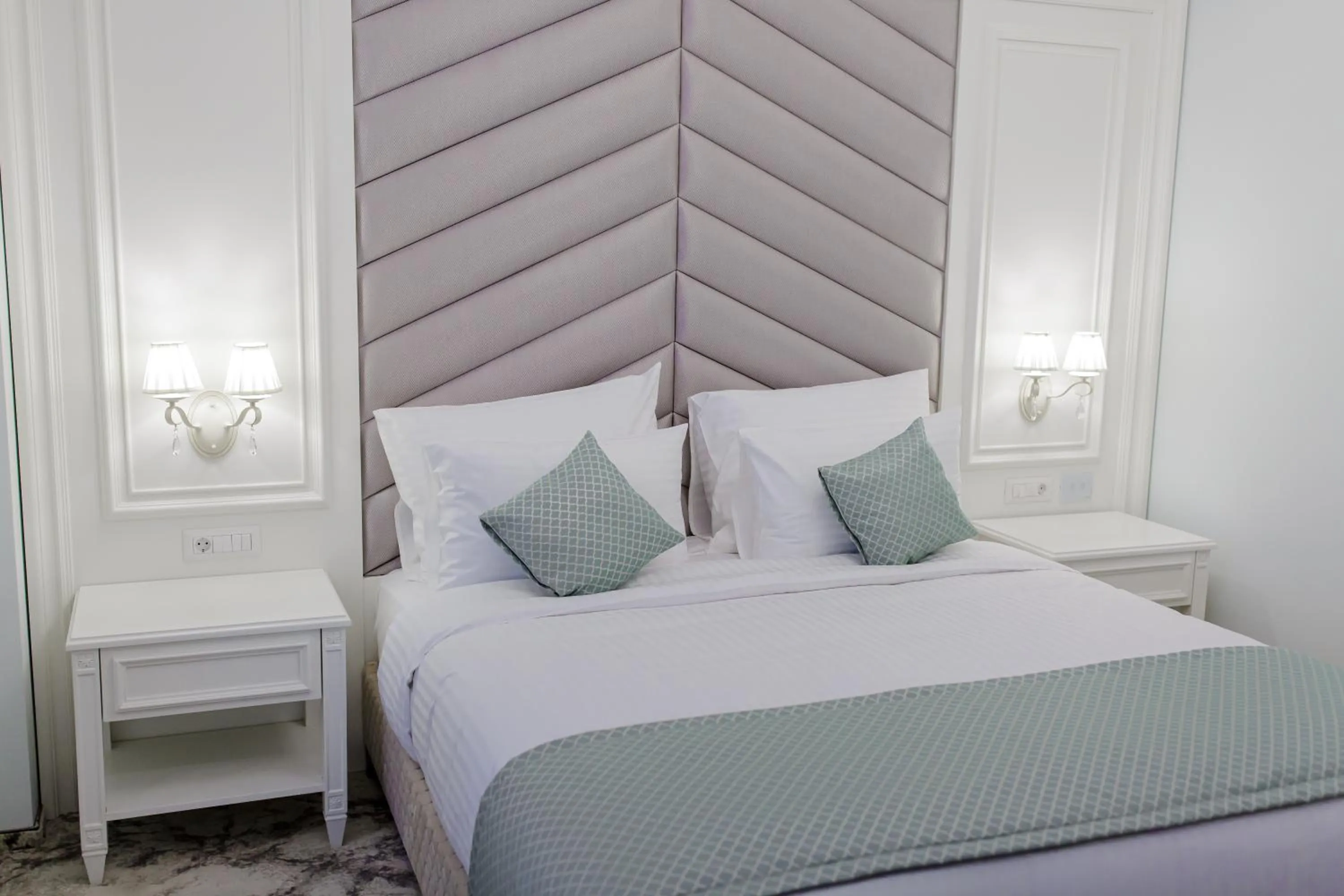 Bed in Muller Hotel Boutique & Spa