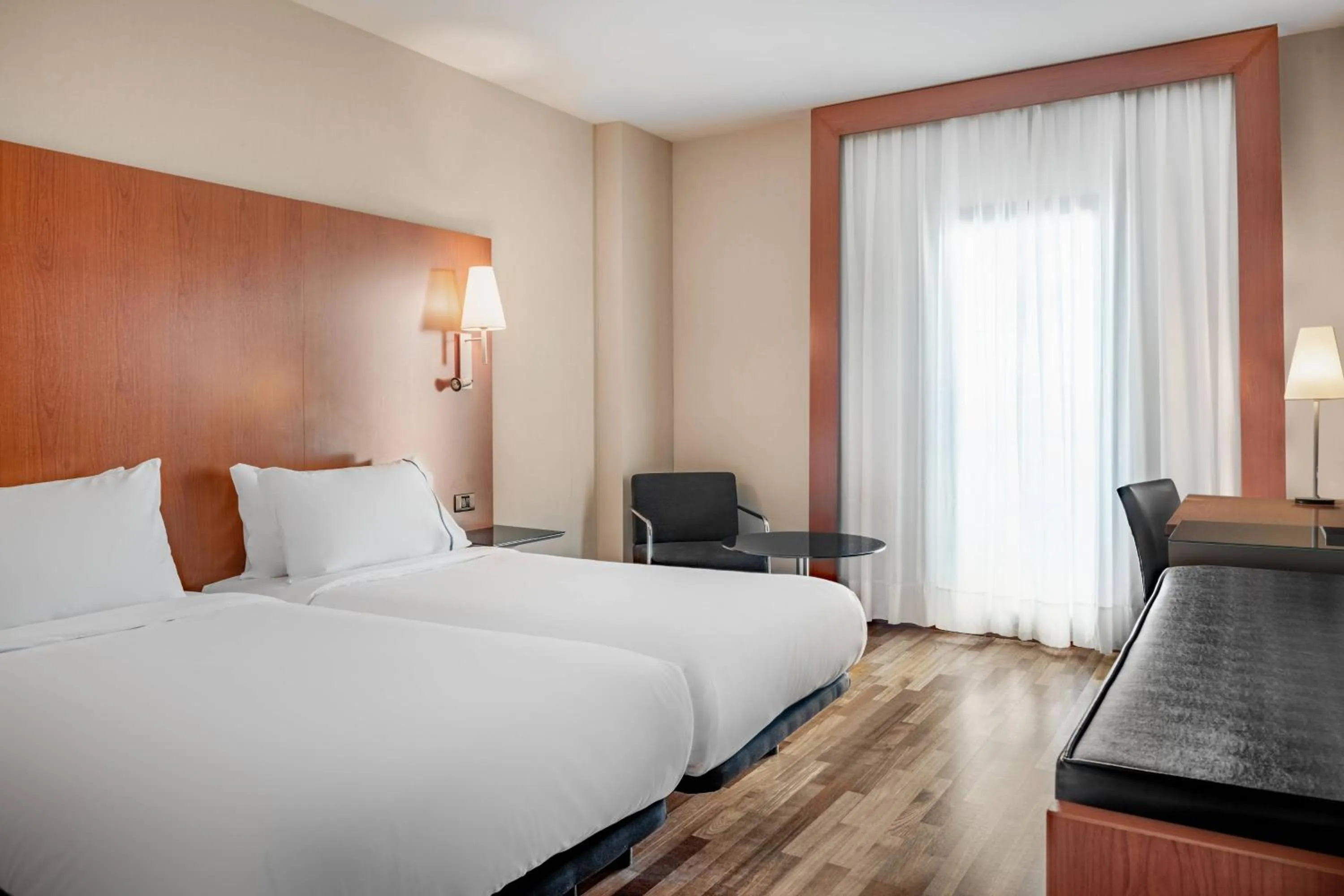 Photo of the whole room, Bed in AC Hotel Badajoz by Marriott