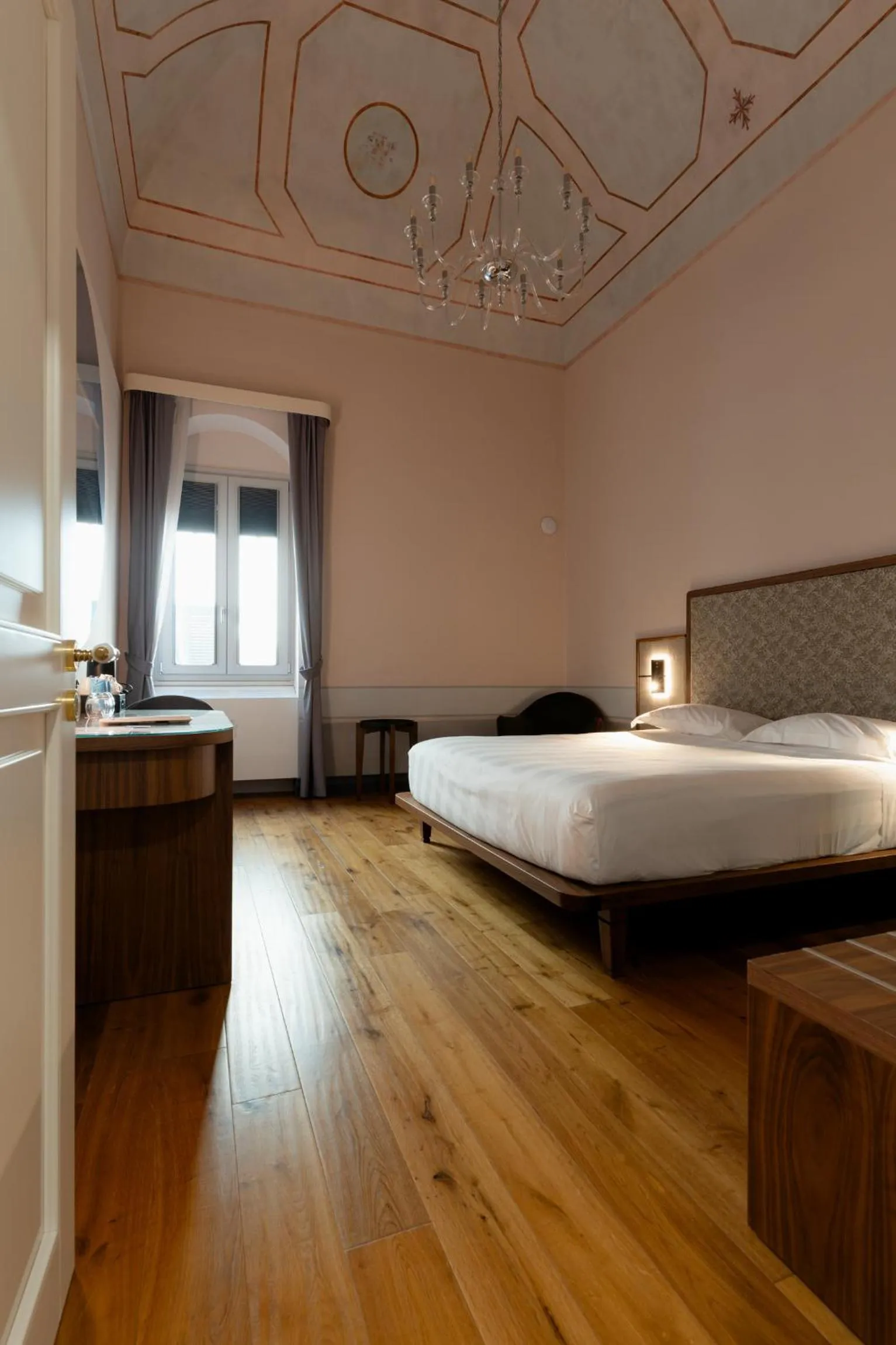 Bed in Lo Stemma Luxury Boutique Hotel