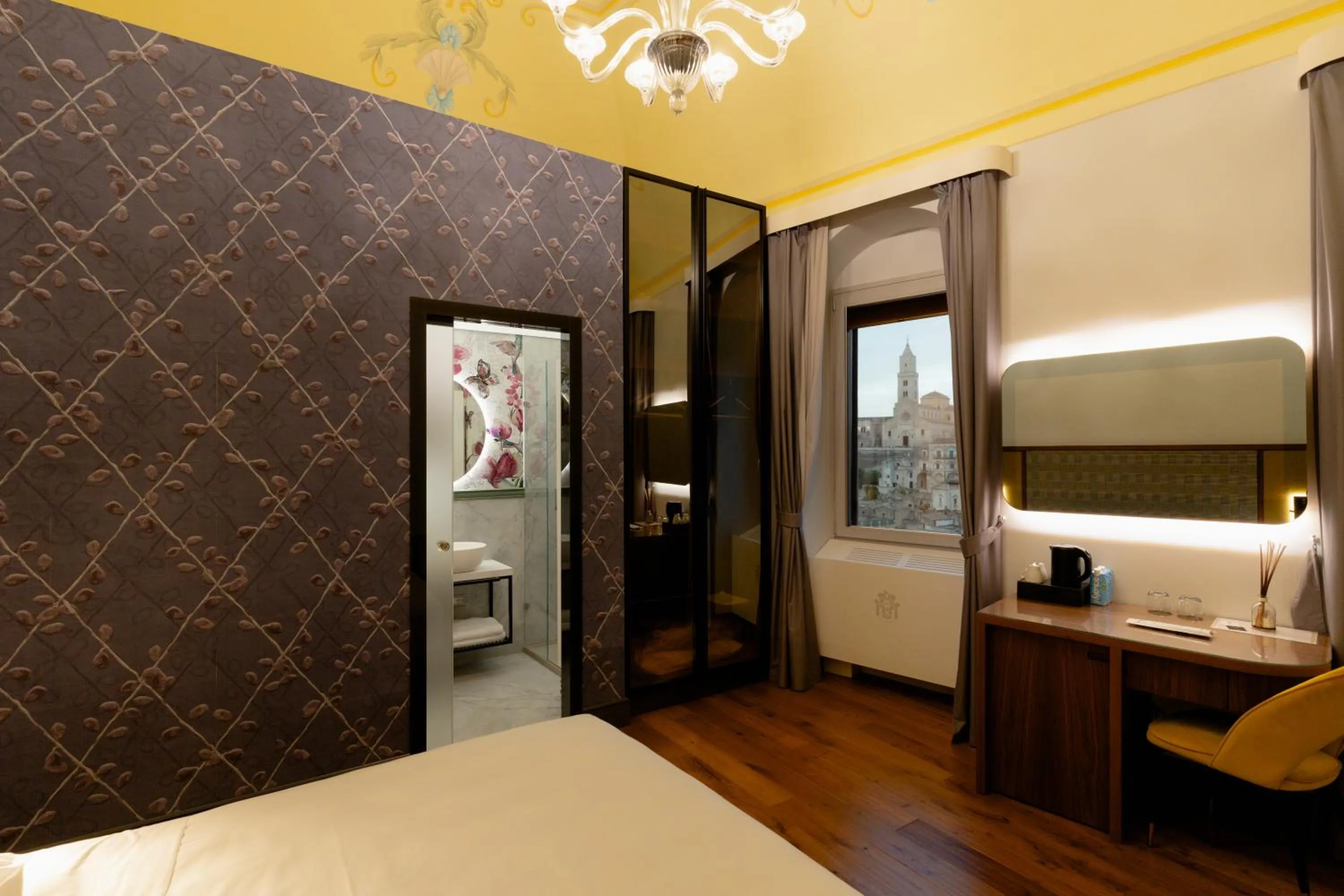 Bed in Lo Stemma Luxury Boutique Hotel