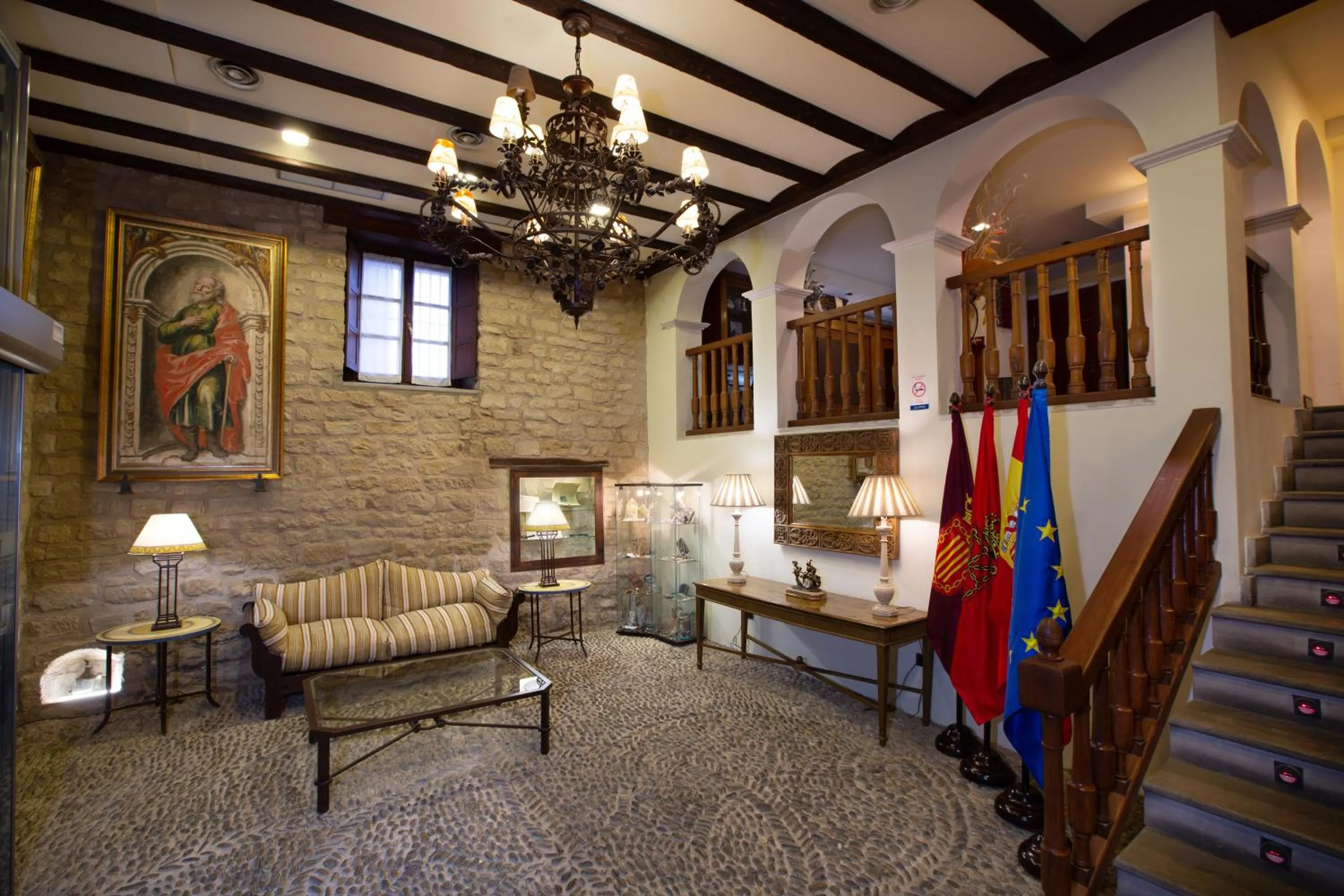 Living room in Hotel Palacio Pujadas by Pandora Hoteles