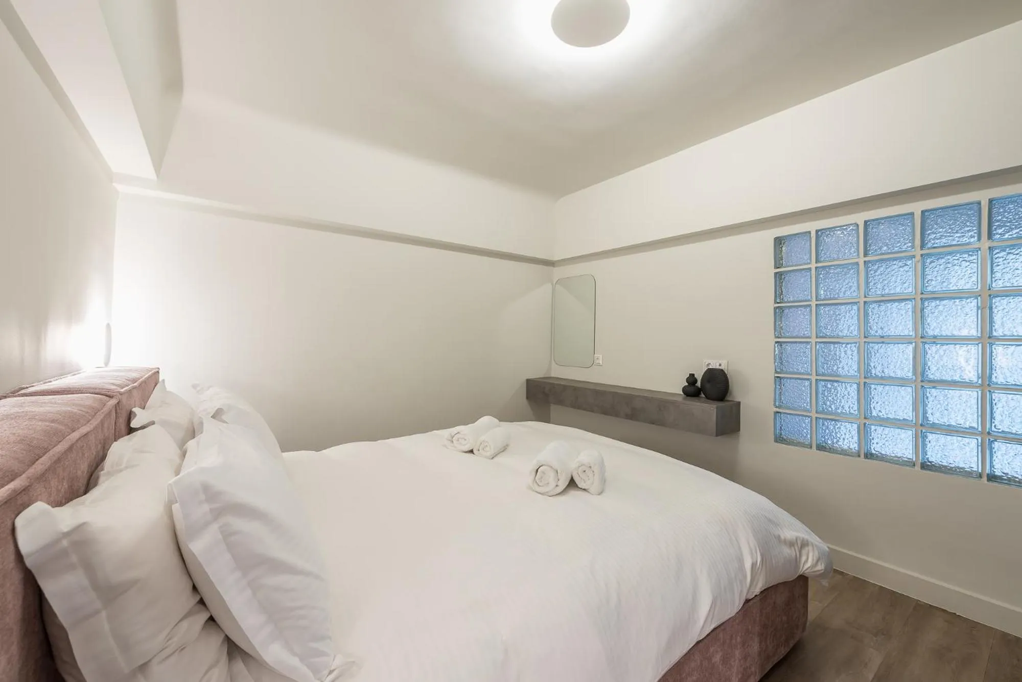 Bed in Aeiphoria Suites & Rooms - Athens