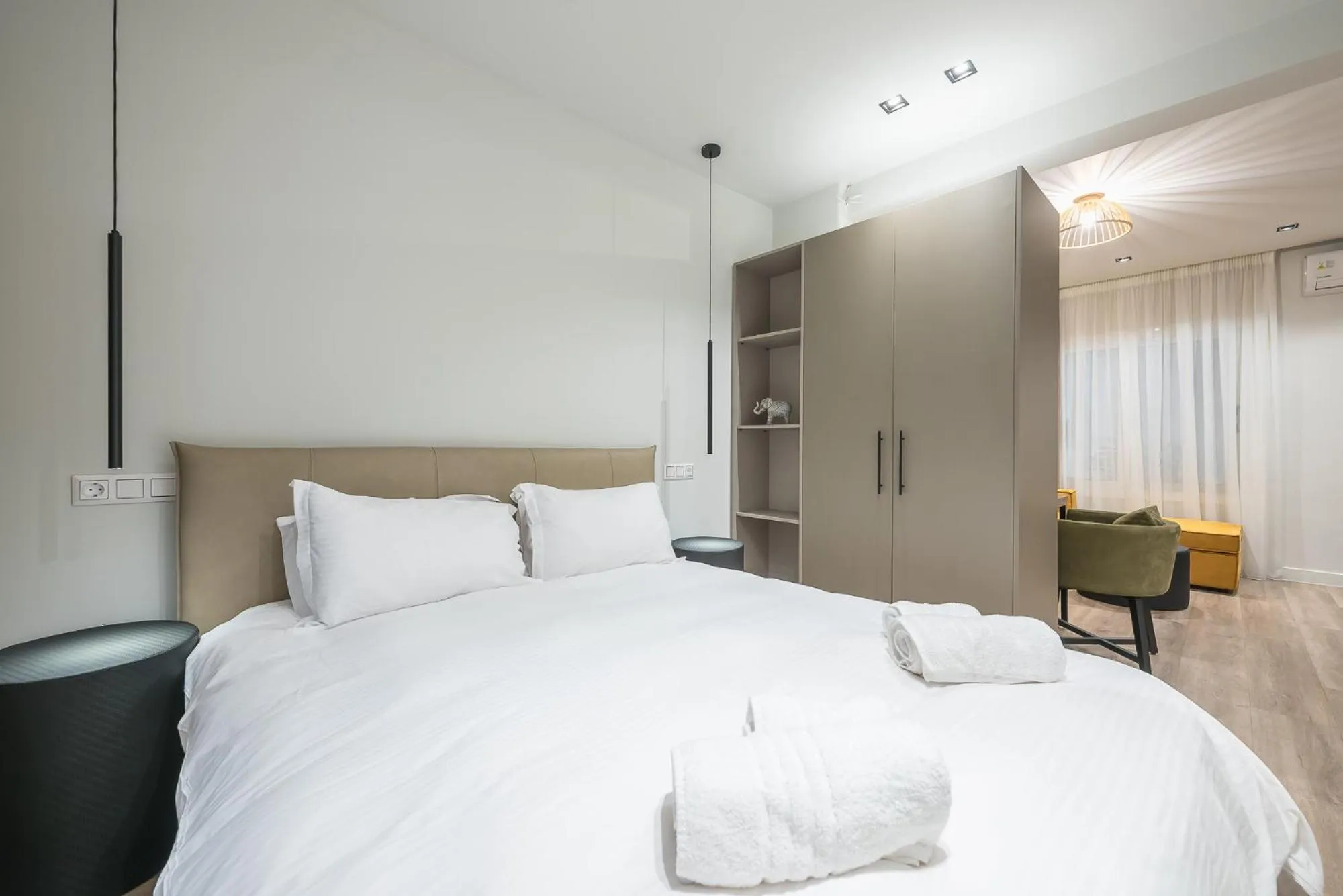 Bed in Aeiphoria Suites & Rooms - Athens