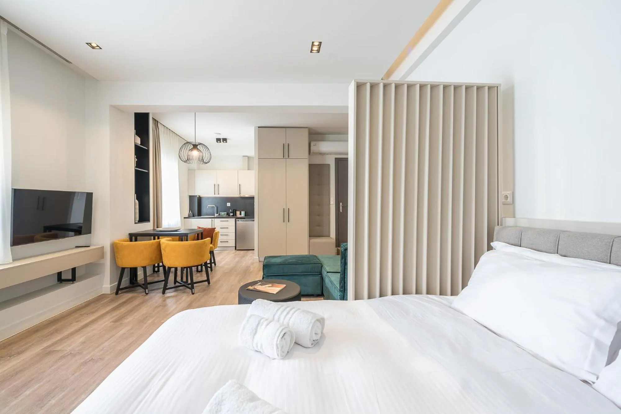 Living room, Bed in Aeiphoria Suites & Rooms - Athens