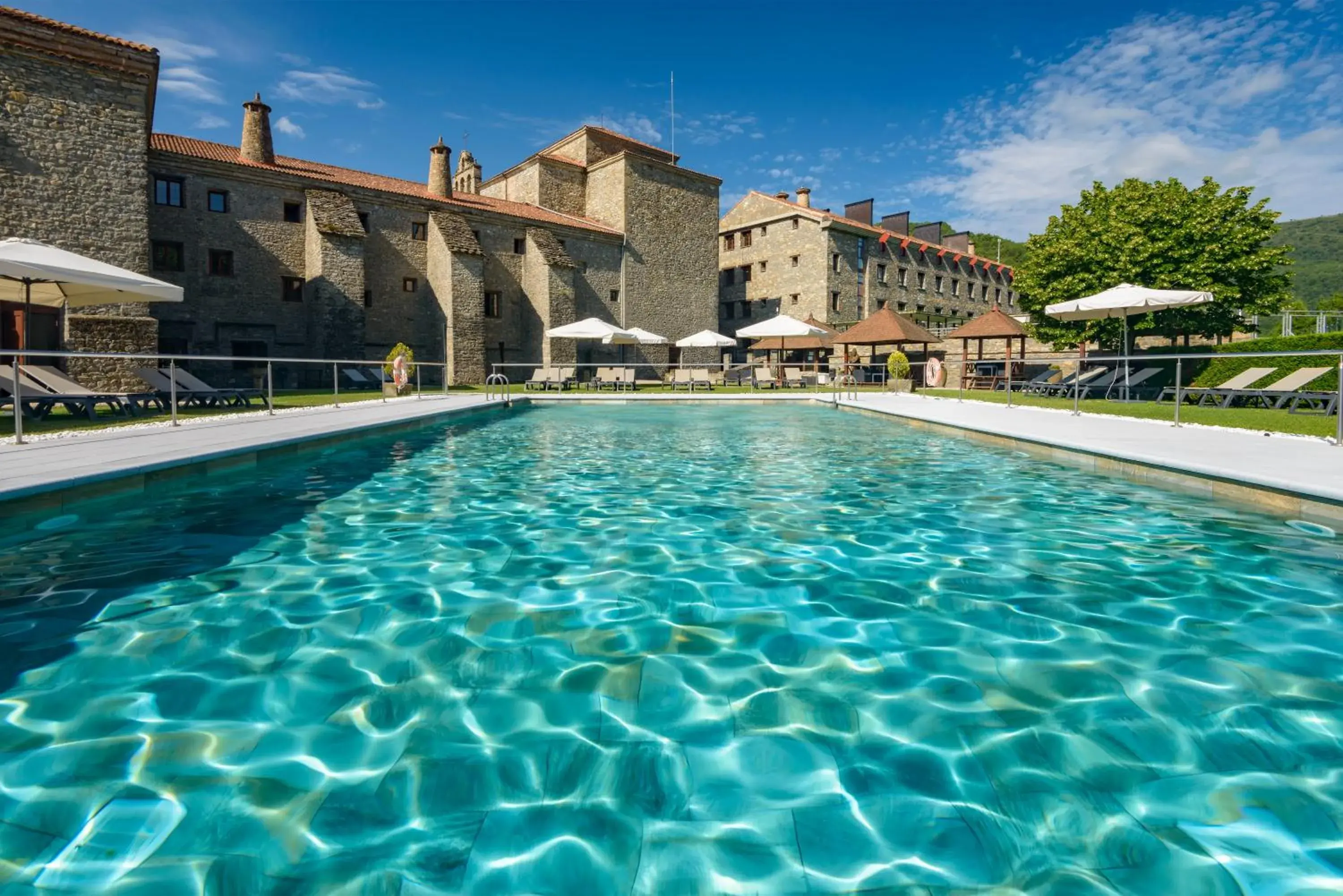 Swimming pool in Hotel & Spa Monasterio de Boltaña Swimming pool in Hotel & Spa Monasterio de Boltaña