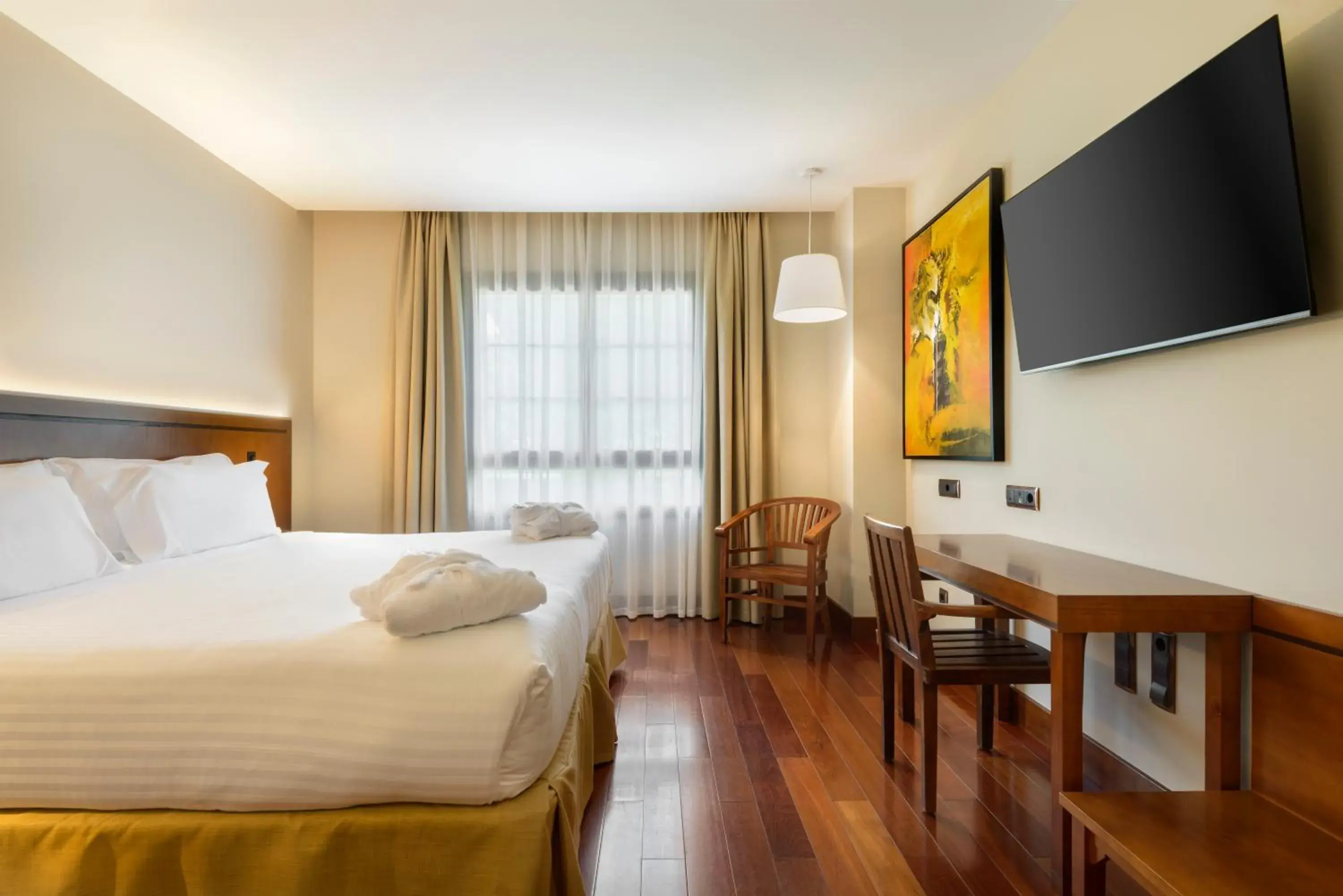 Bed in Hotel & Spa Monasterio de Boltaña Bed in Hotel & Spa Monasterio de Boltaña