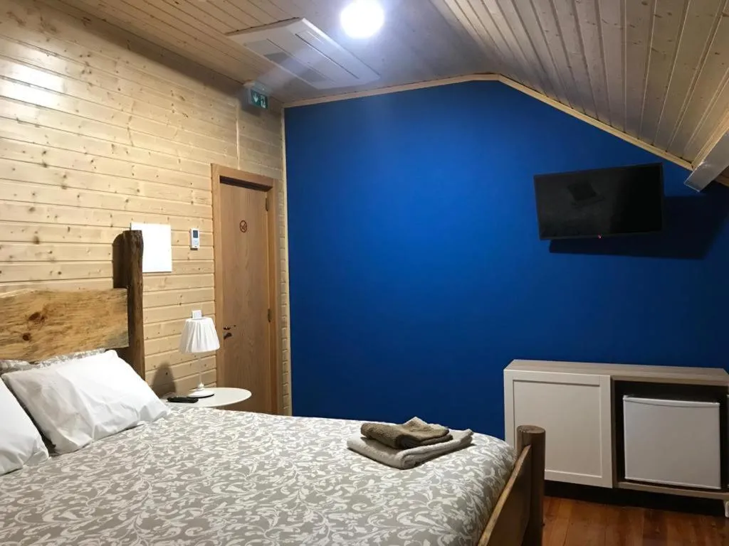 Communal lounge/ TV room, Bed in Nerinha Residence