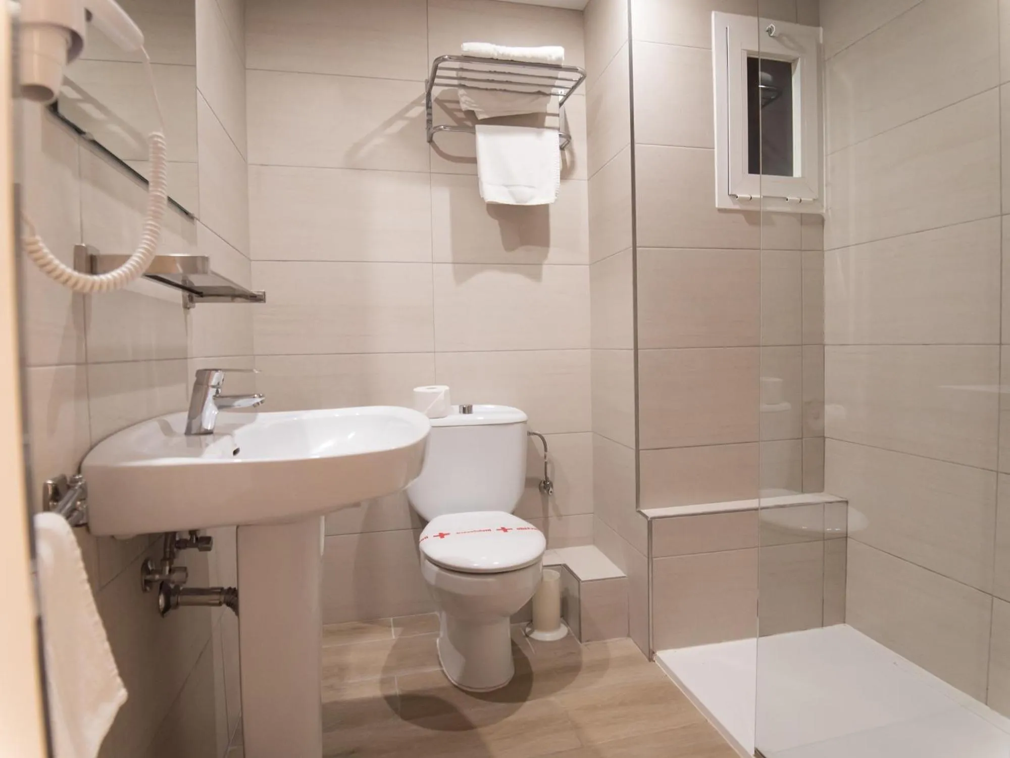 Bathroom in Seramar Hotel Luna Park Adults Only