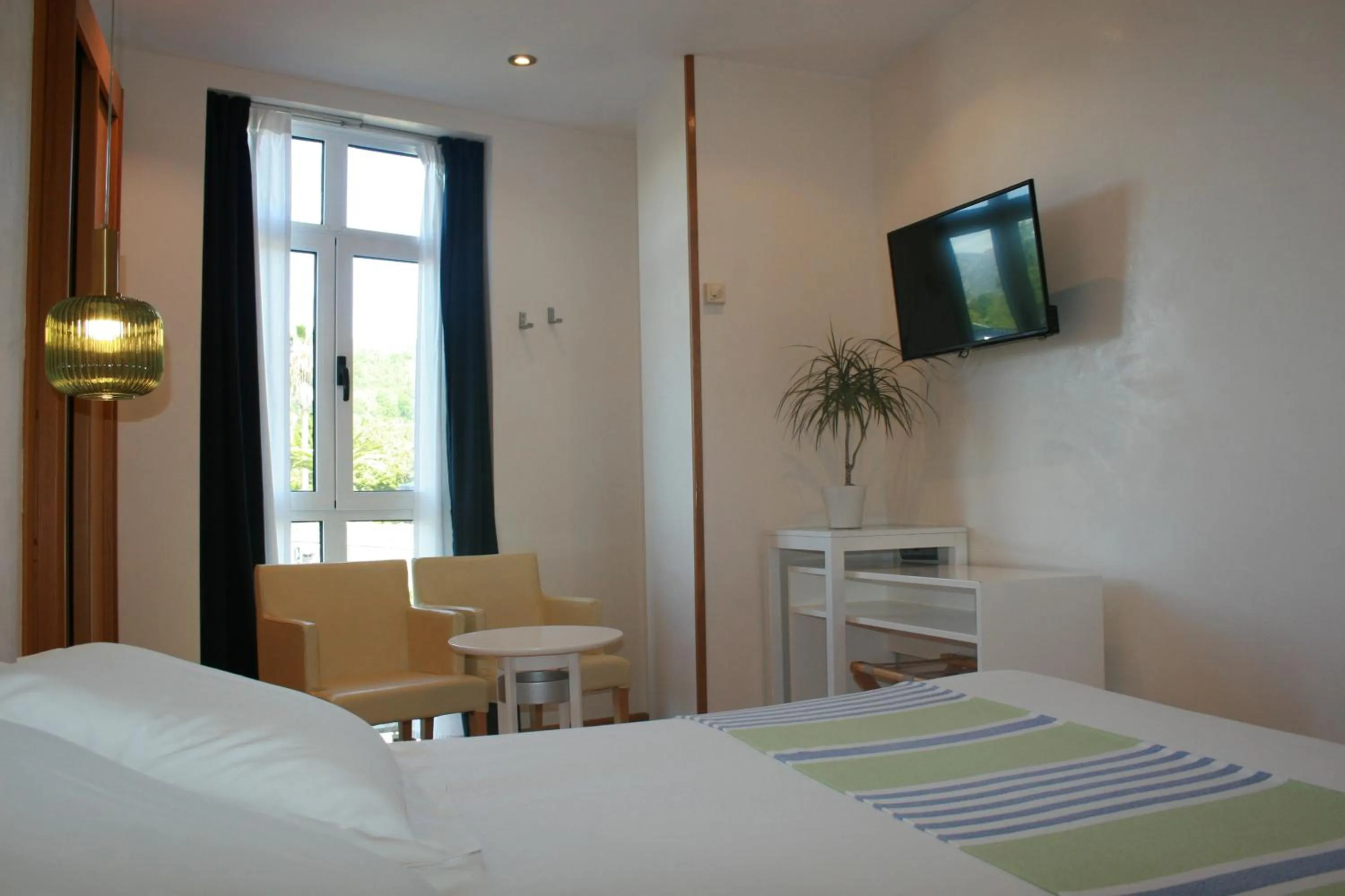 Bedroom in Hotel Nochendi