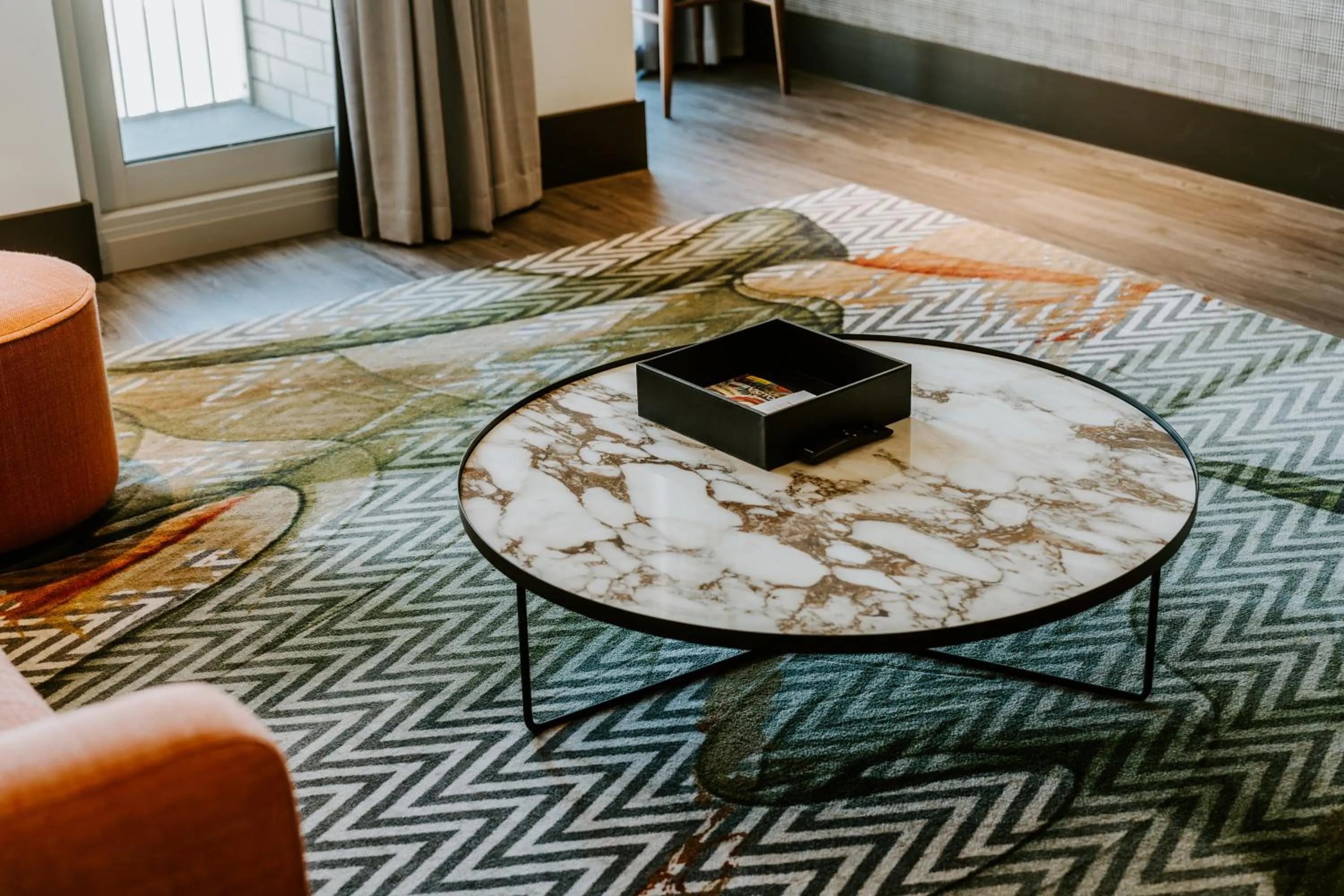 Living room in The Motley Hotel Richmond, Tapestry Collection by Hilton