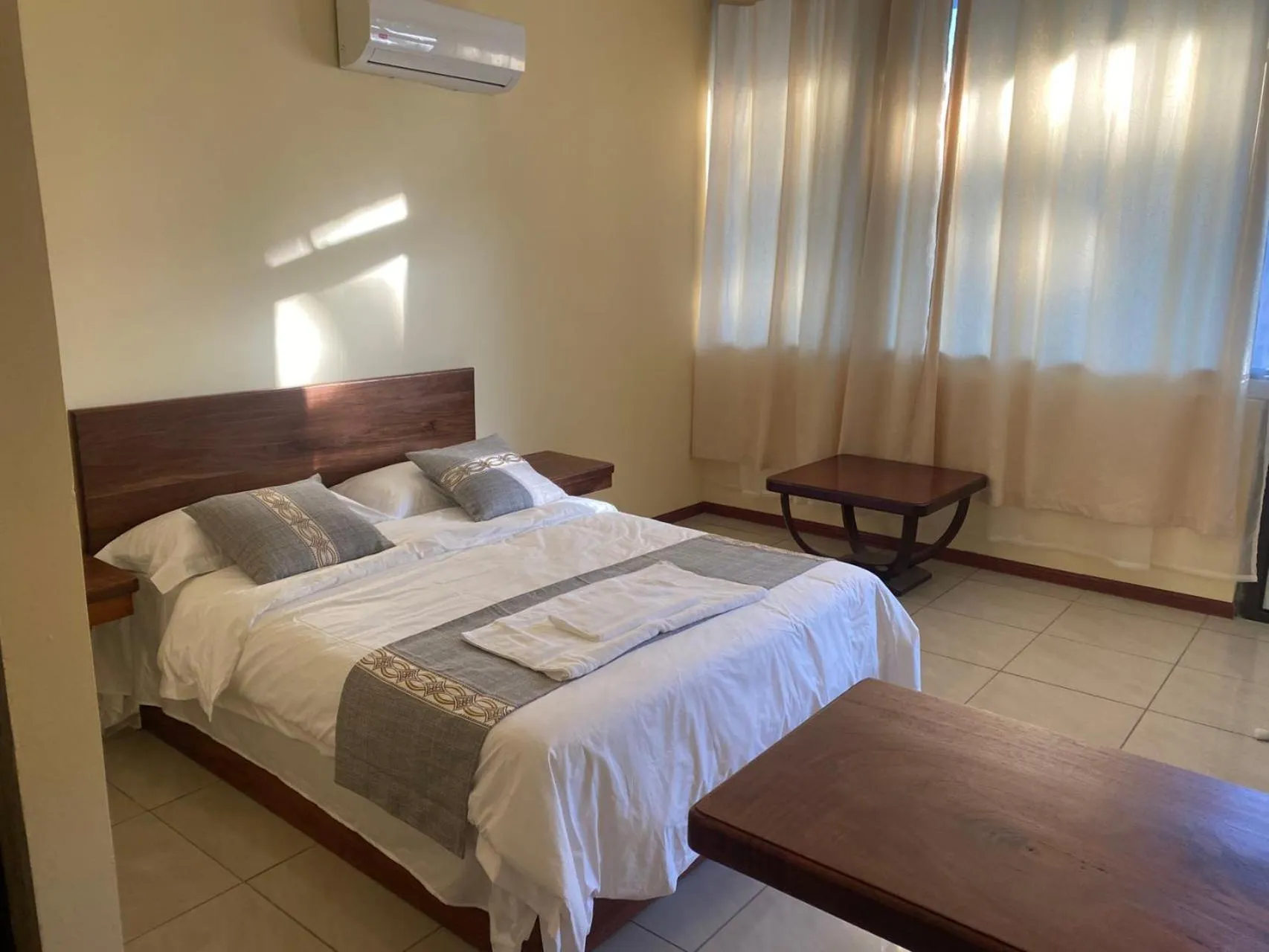 air conditioner, Bed in Villa Garita Inn