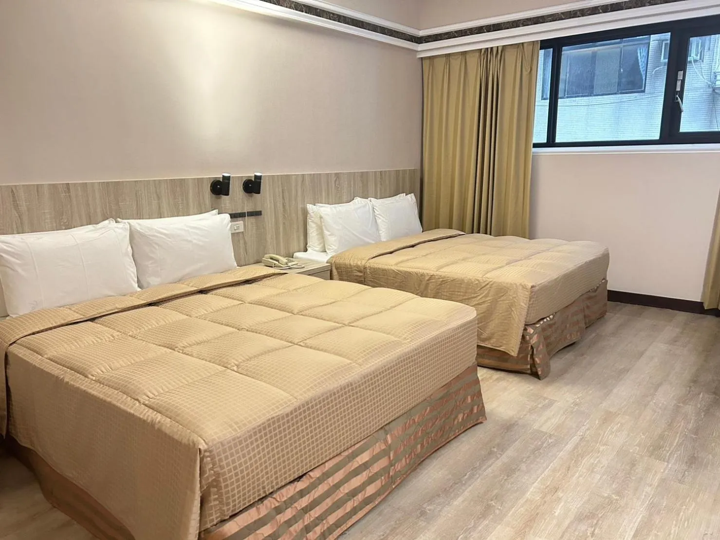 Bed in Doitsu Hotel