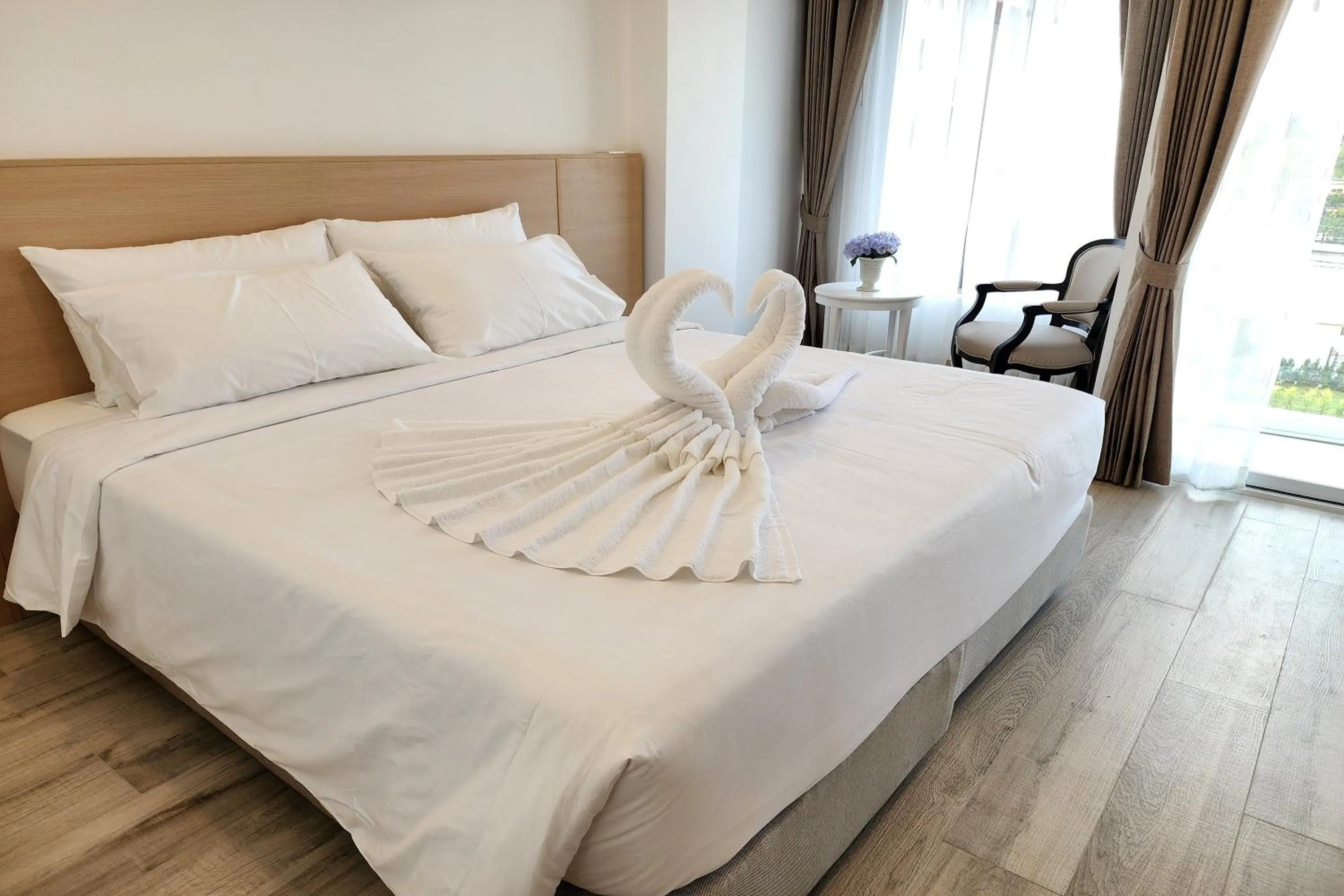 Bed in Arsh Boutique Hotel