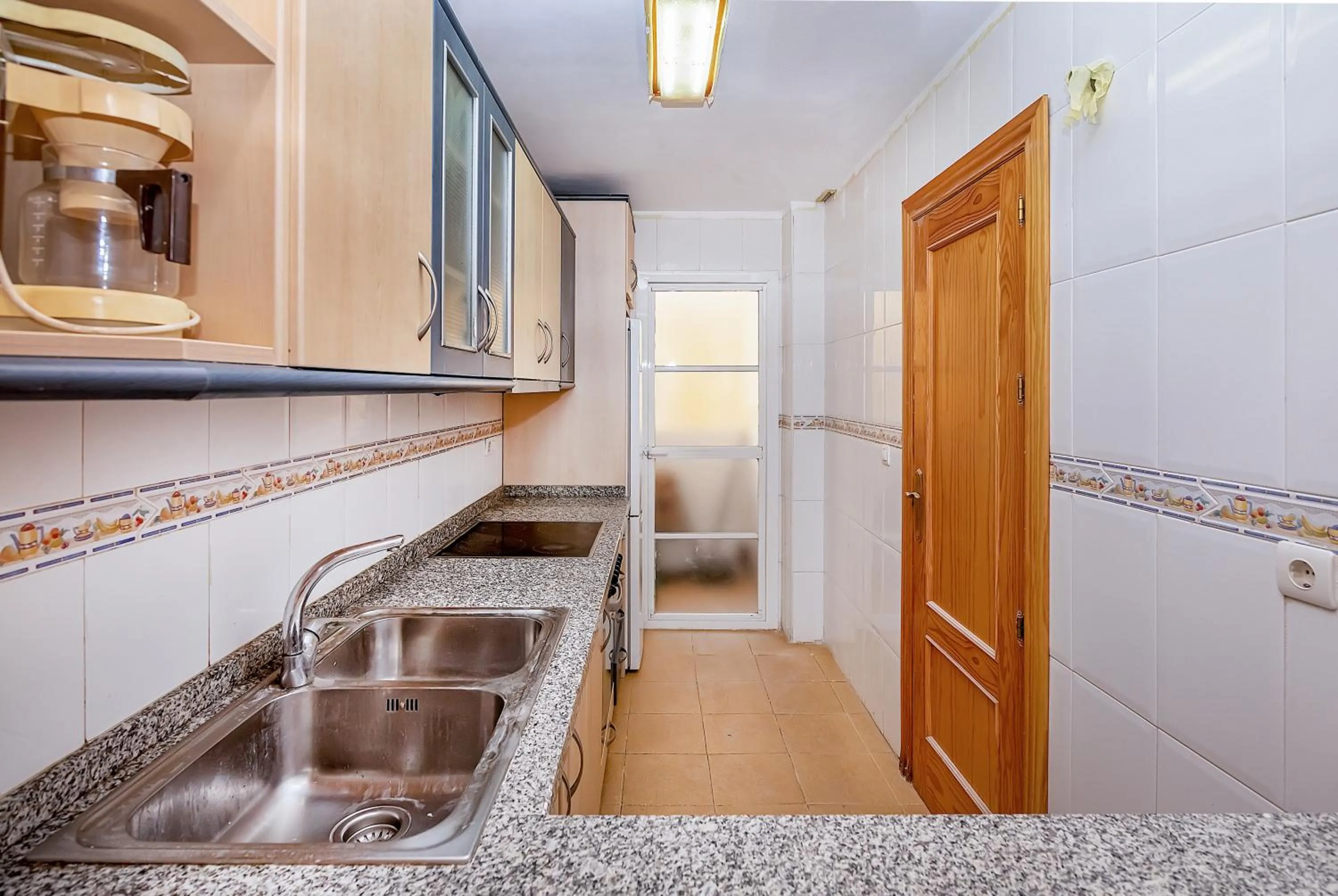 Kitchen or kitchenette in San Rafael City Center Apartment