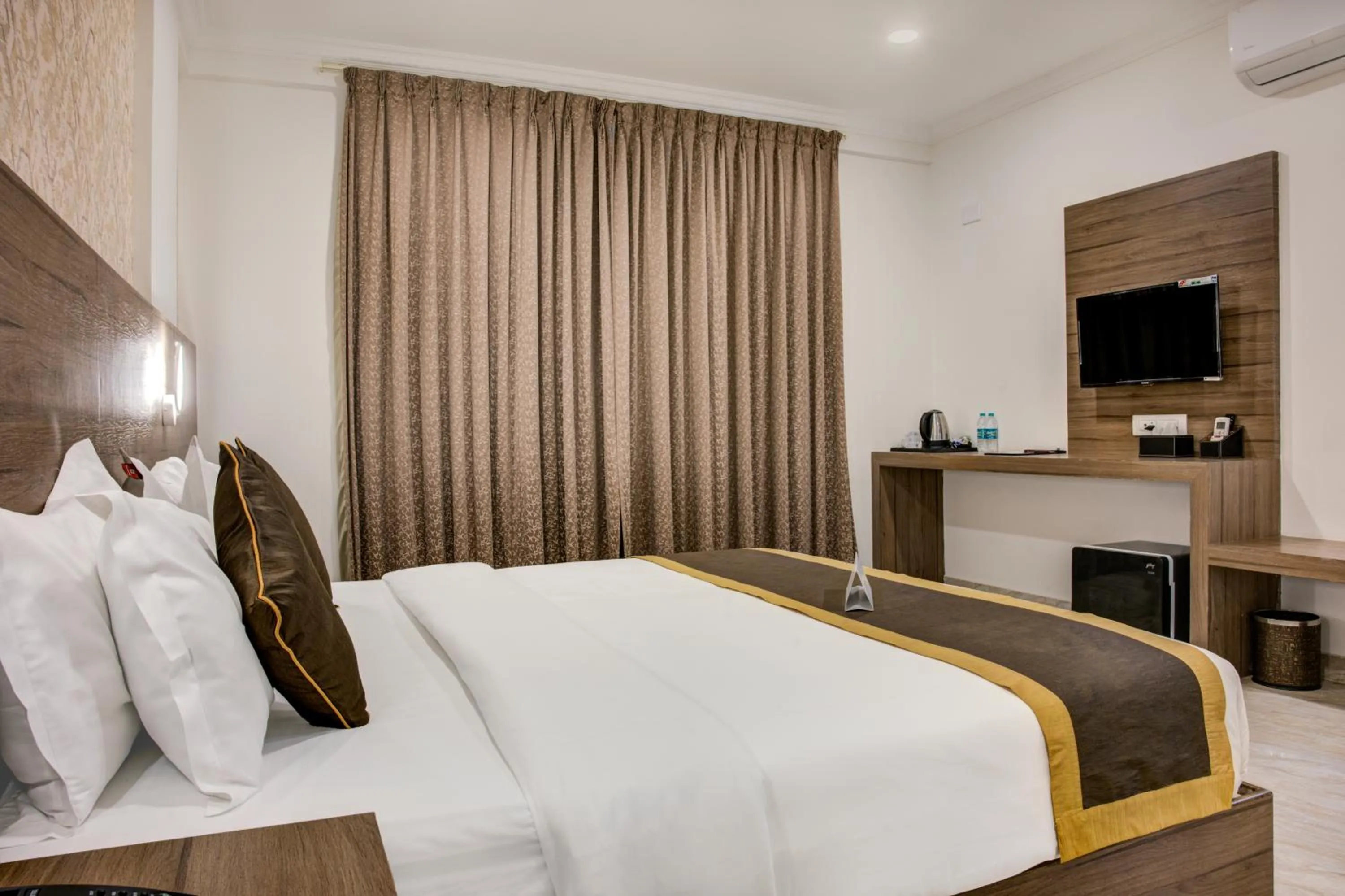 Bed in Hotel Sterling Inn Bangalore International Airport