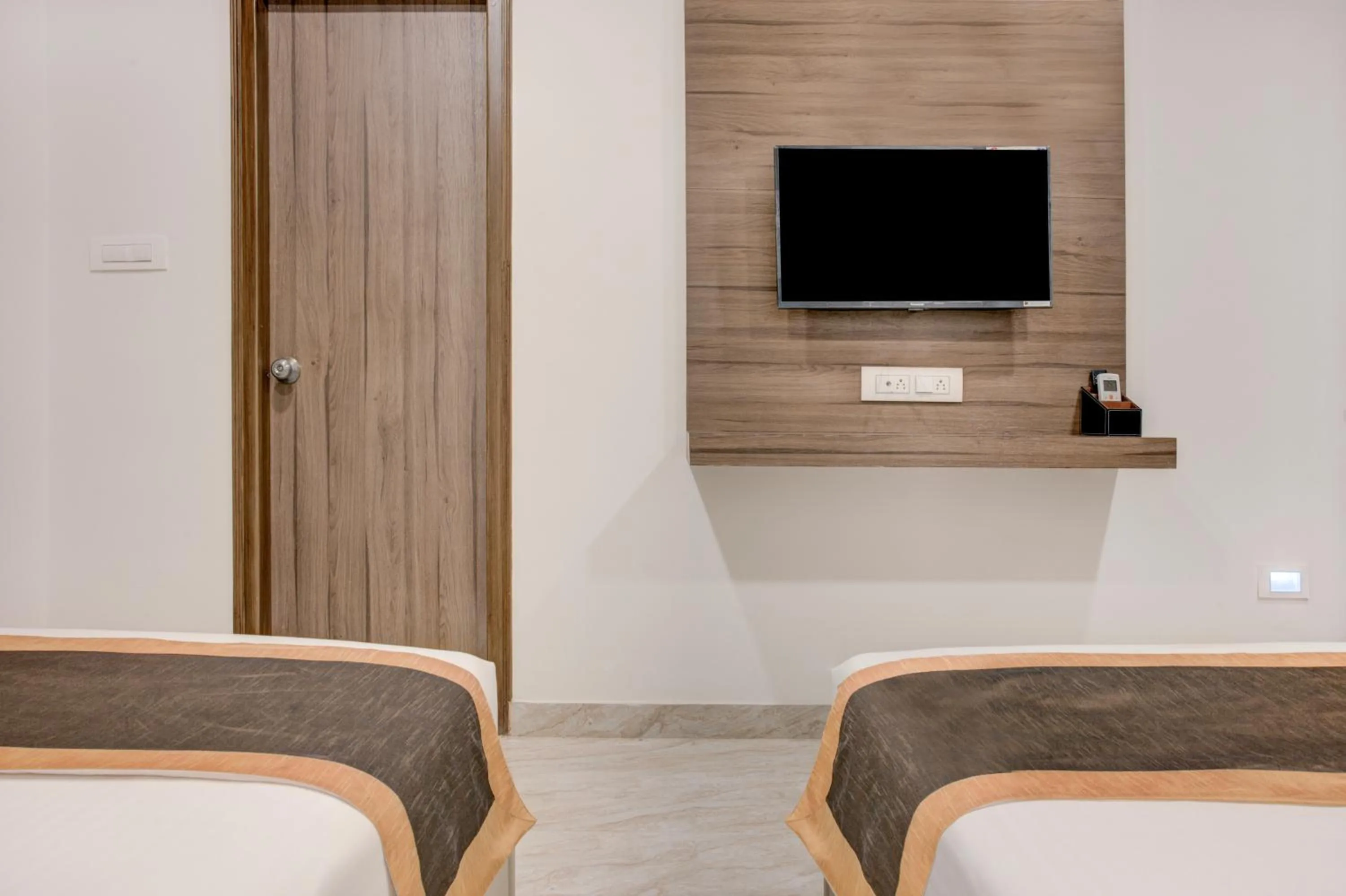 Bed in Hotel Sterling Inn Bangalore International Airport