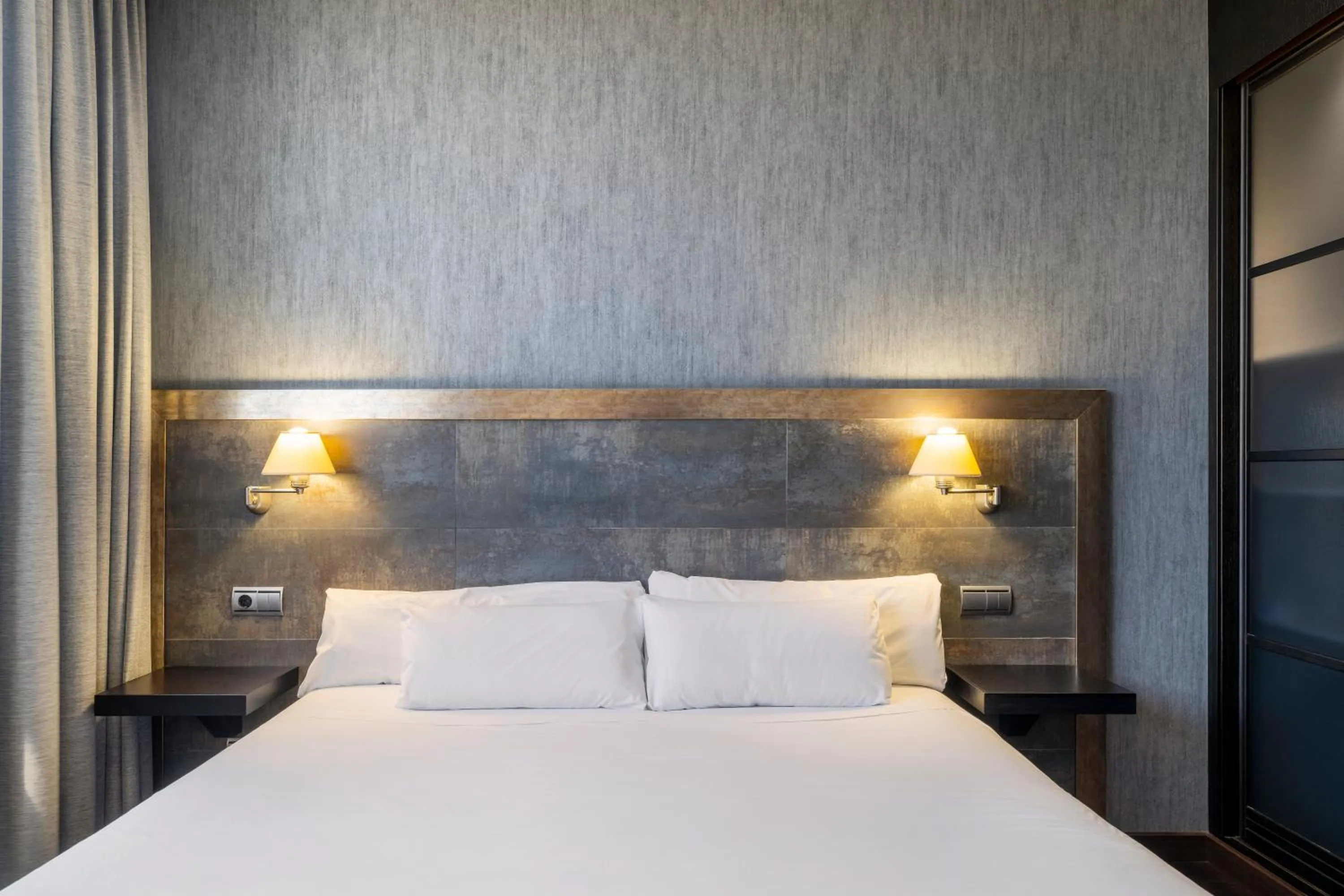 Bed in Iberik Santo Domingo Plaza Hotel