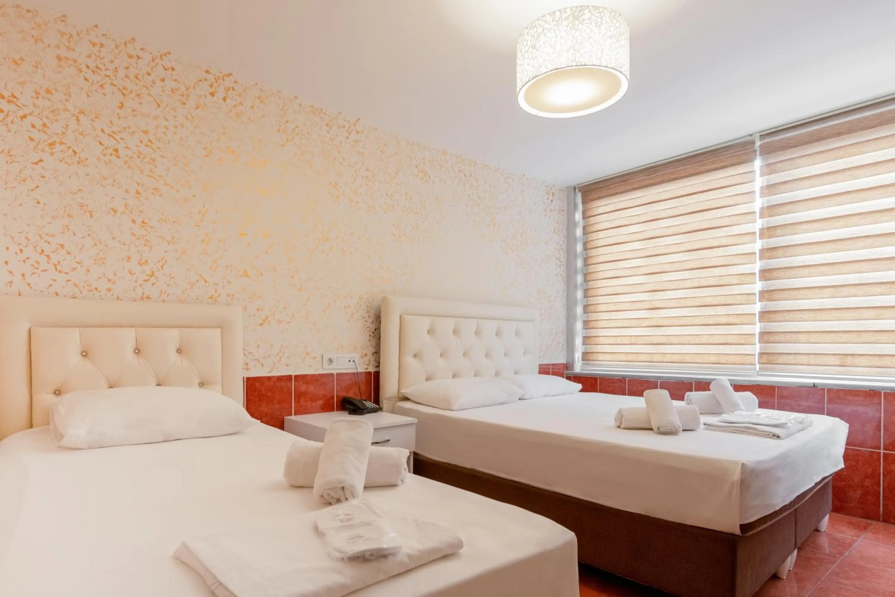 Bed in The Center Hotel