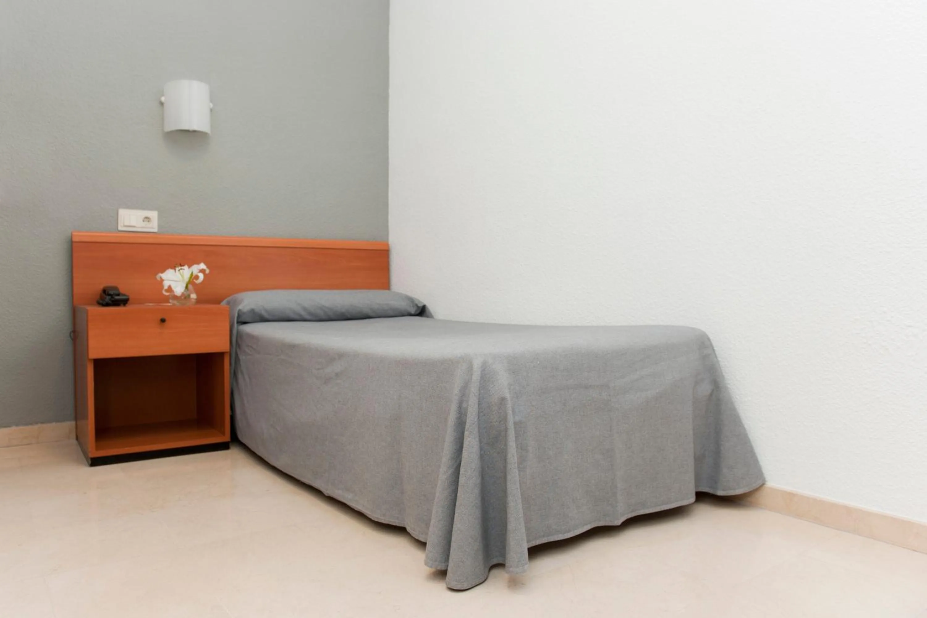 Bed in Hotel El Palmeral