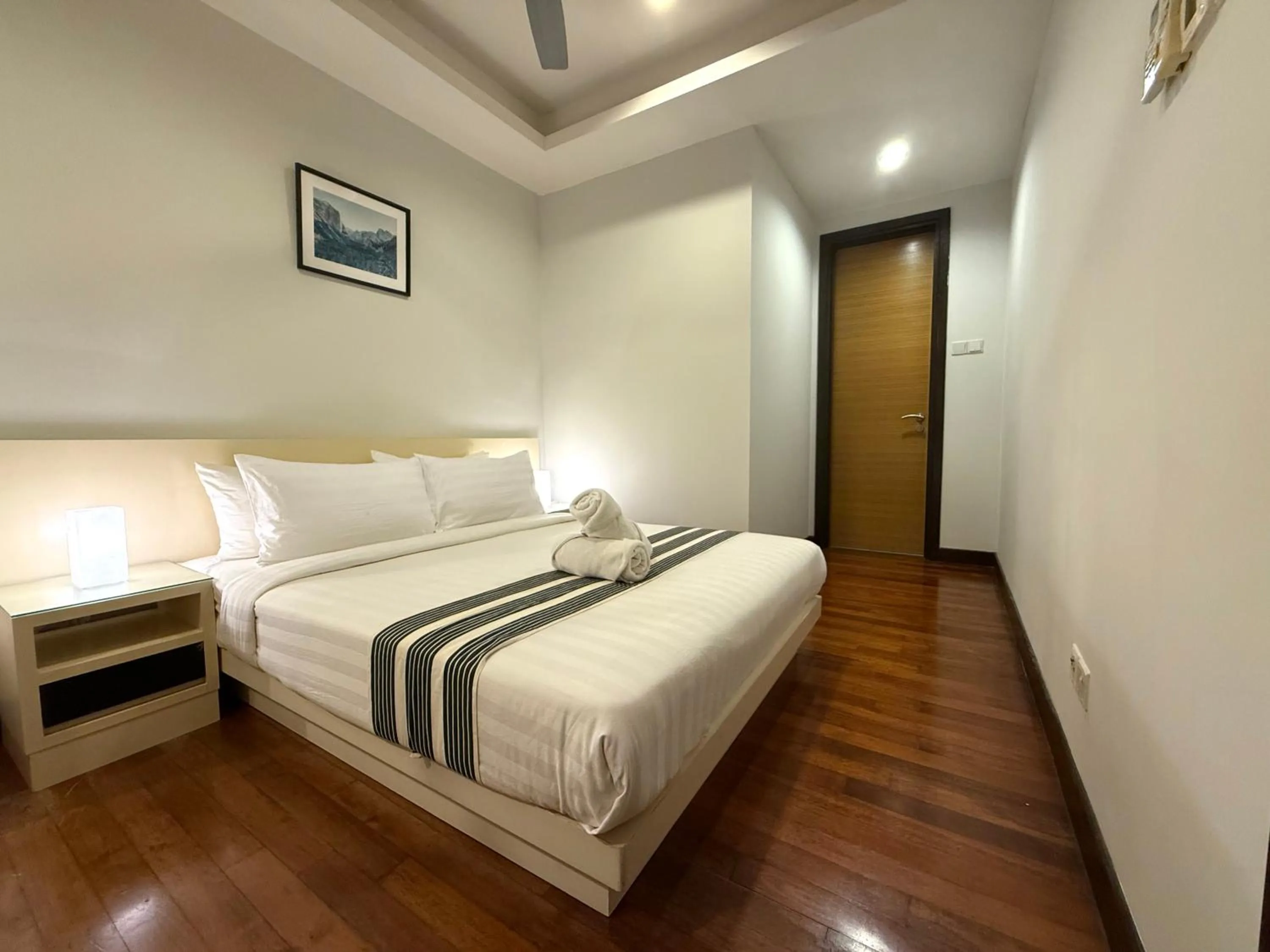 Bed in CozyHome Suites @ Casa Residency
