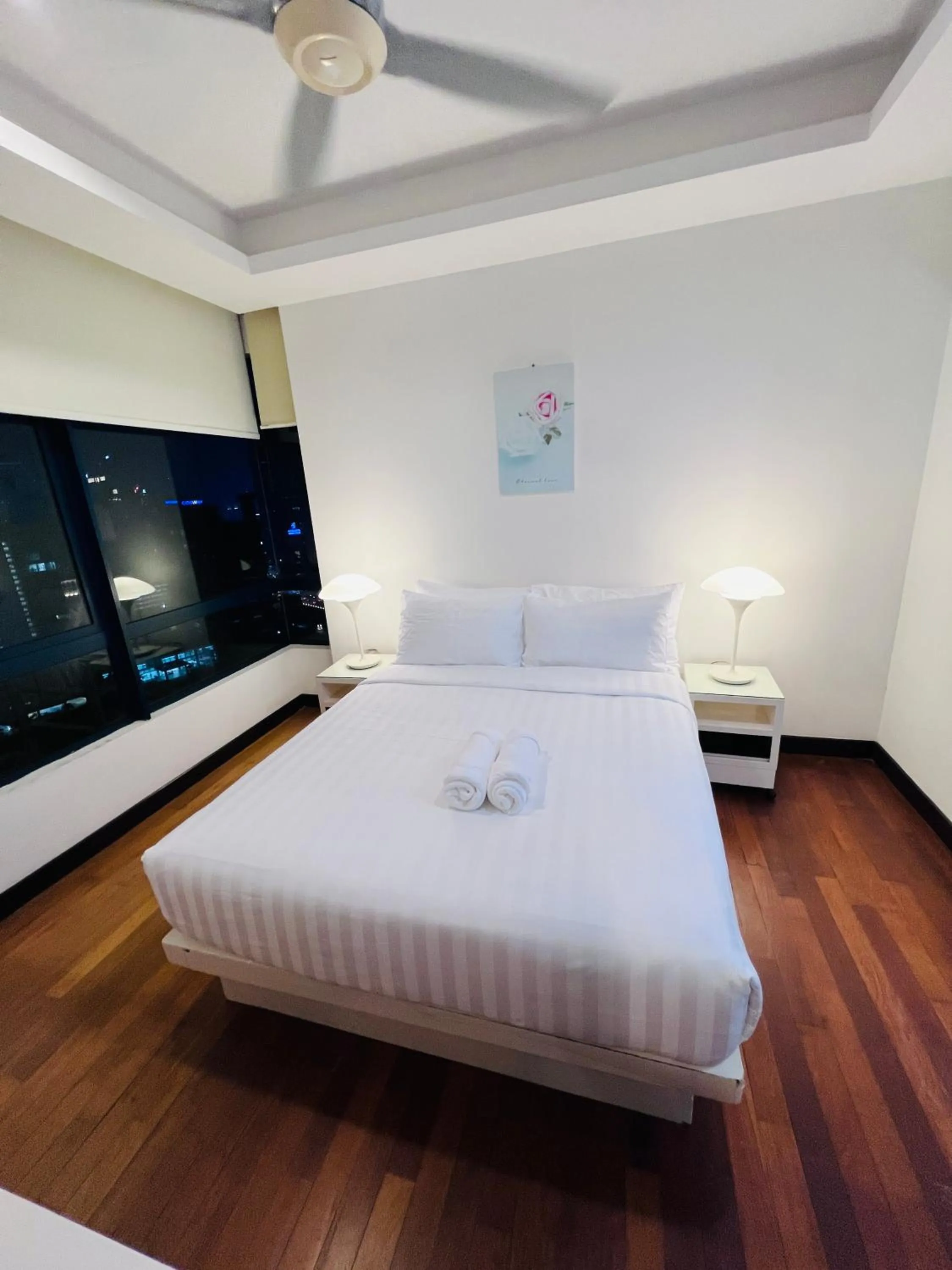 Bedroom, Bed in CozyHome Suites @ Casa Residency