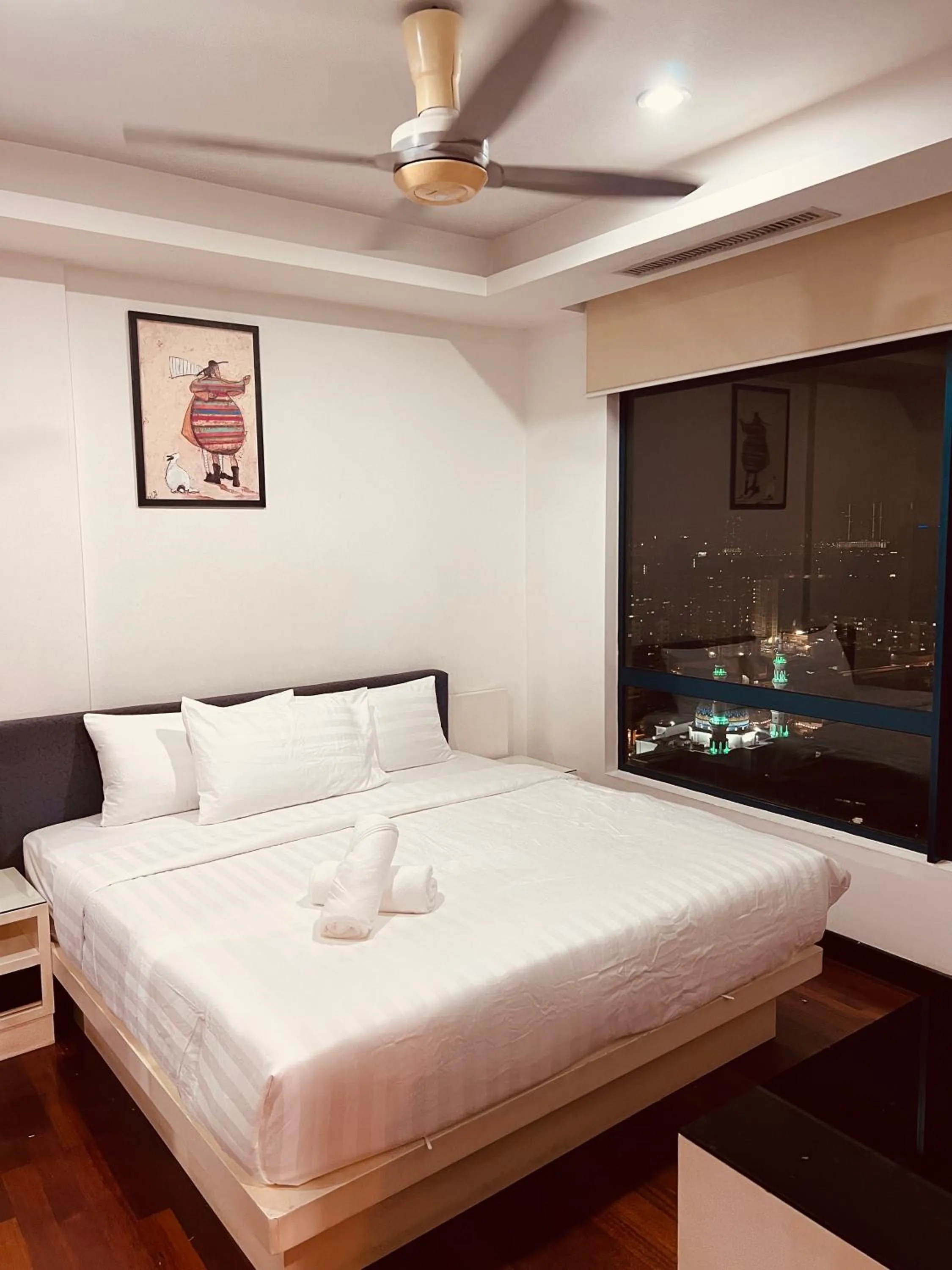 Bedroom, Bed in CozyHome Suites @ Casa Residency