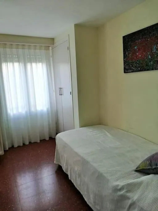 Bedroom, Bed in Apartamento Lina, a 20 metros de la playa