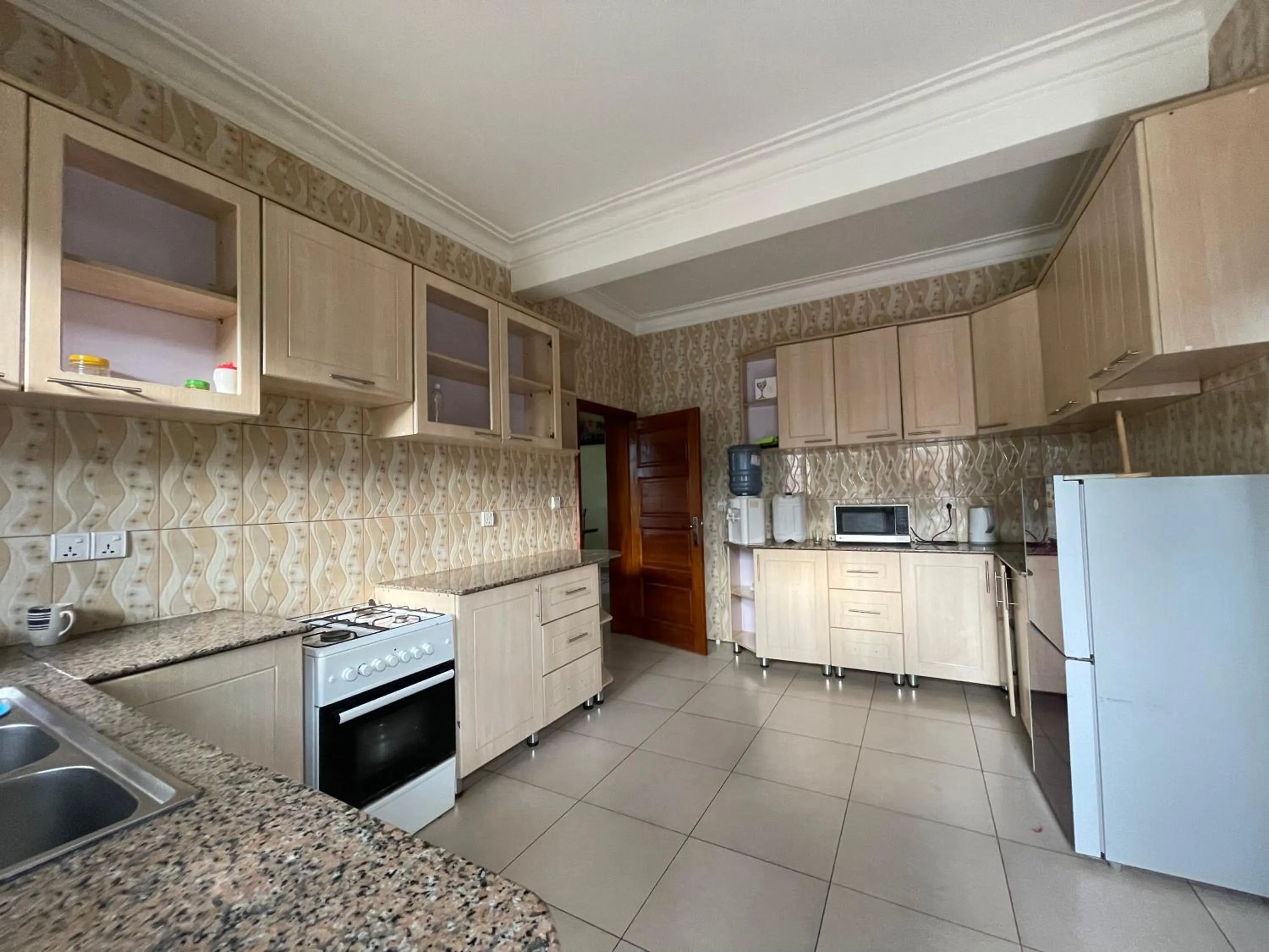 Kitchen or kitchenette in Captivating 7-Bed House in Kigali Rwanda