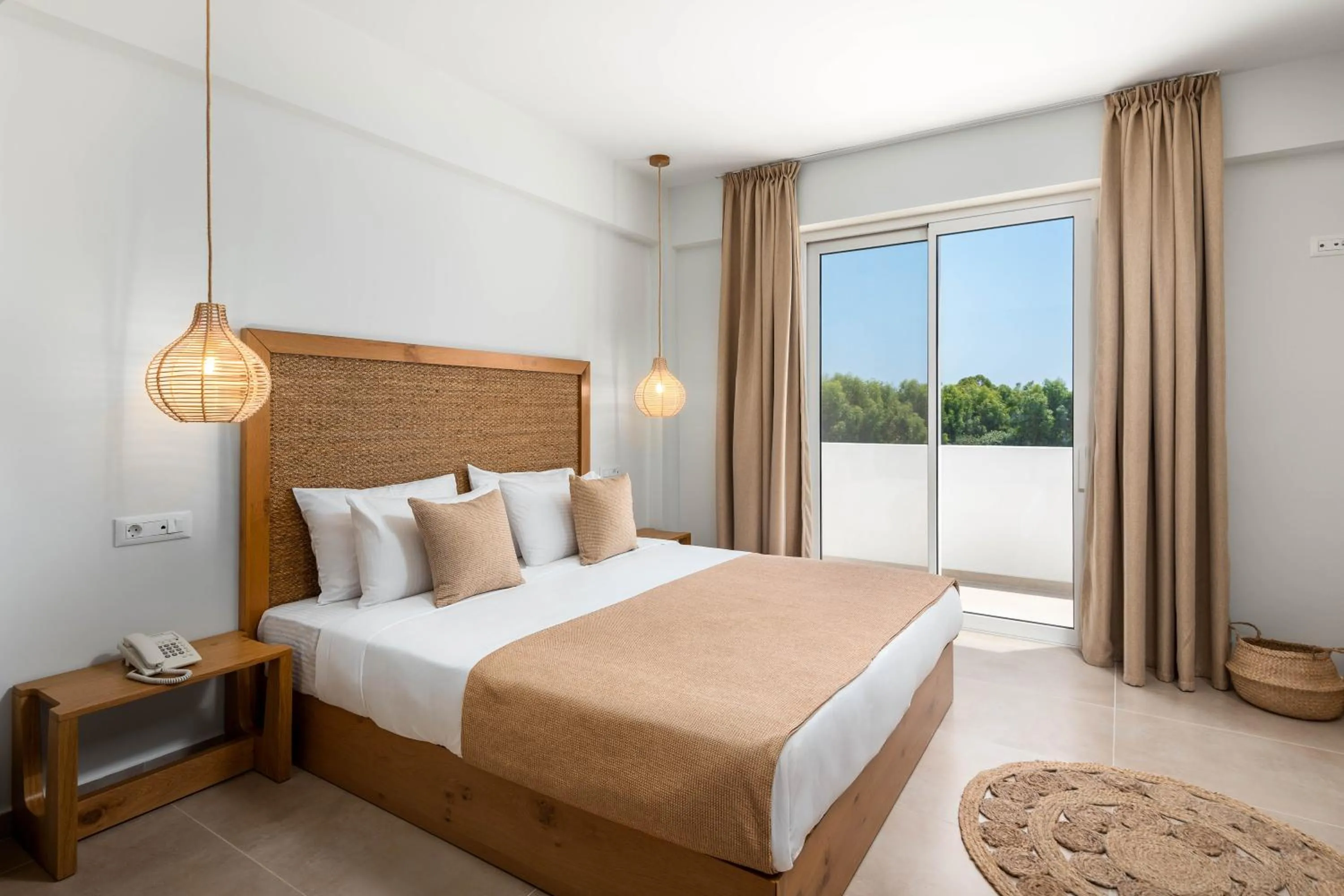 Bed in Absolute Kiotari Resort