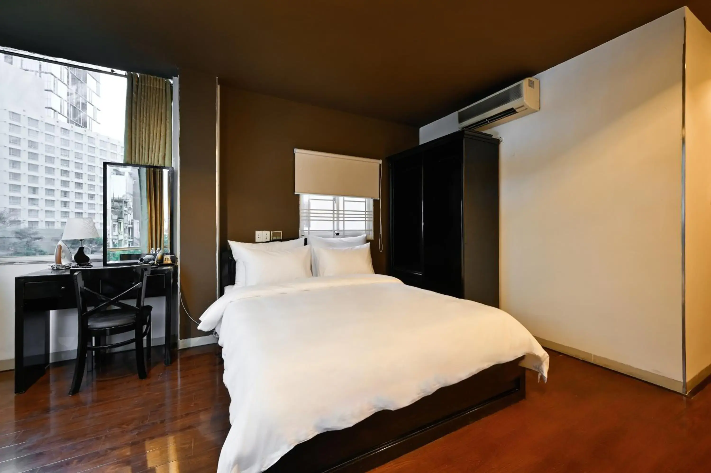 Bed in The Noble Swan Hotel New World Bed in The Noble Swan Hotel New World