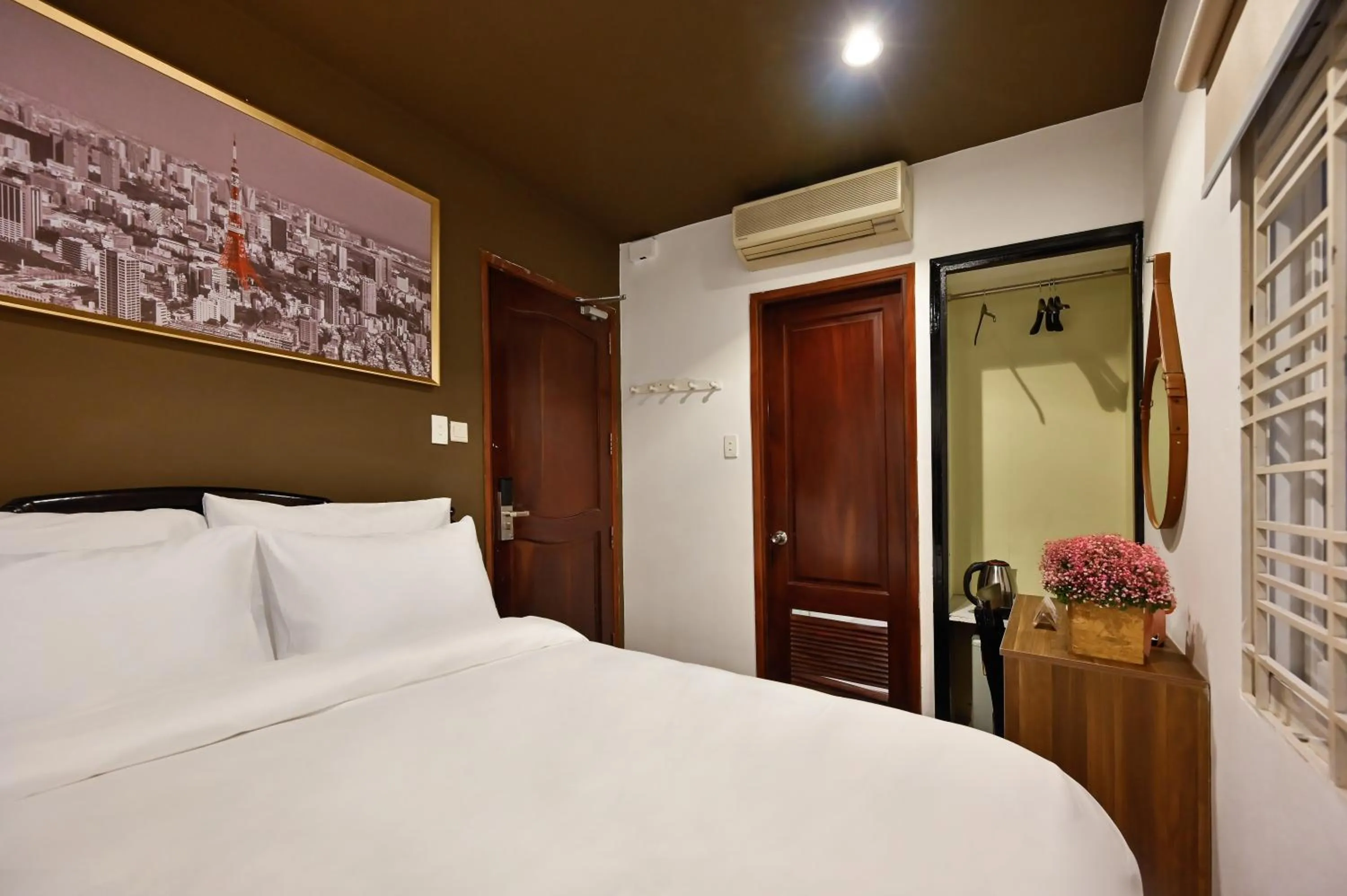 Bedroom in The Noble Swan Hotel New World