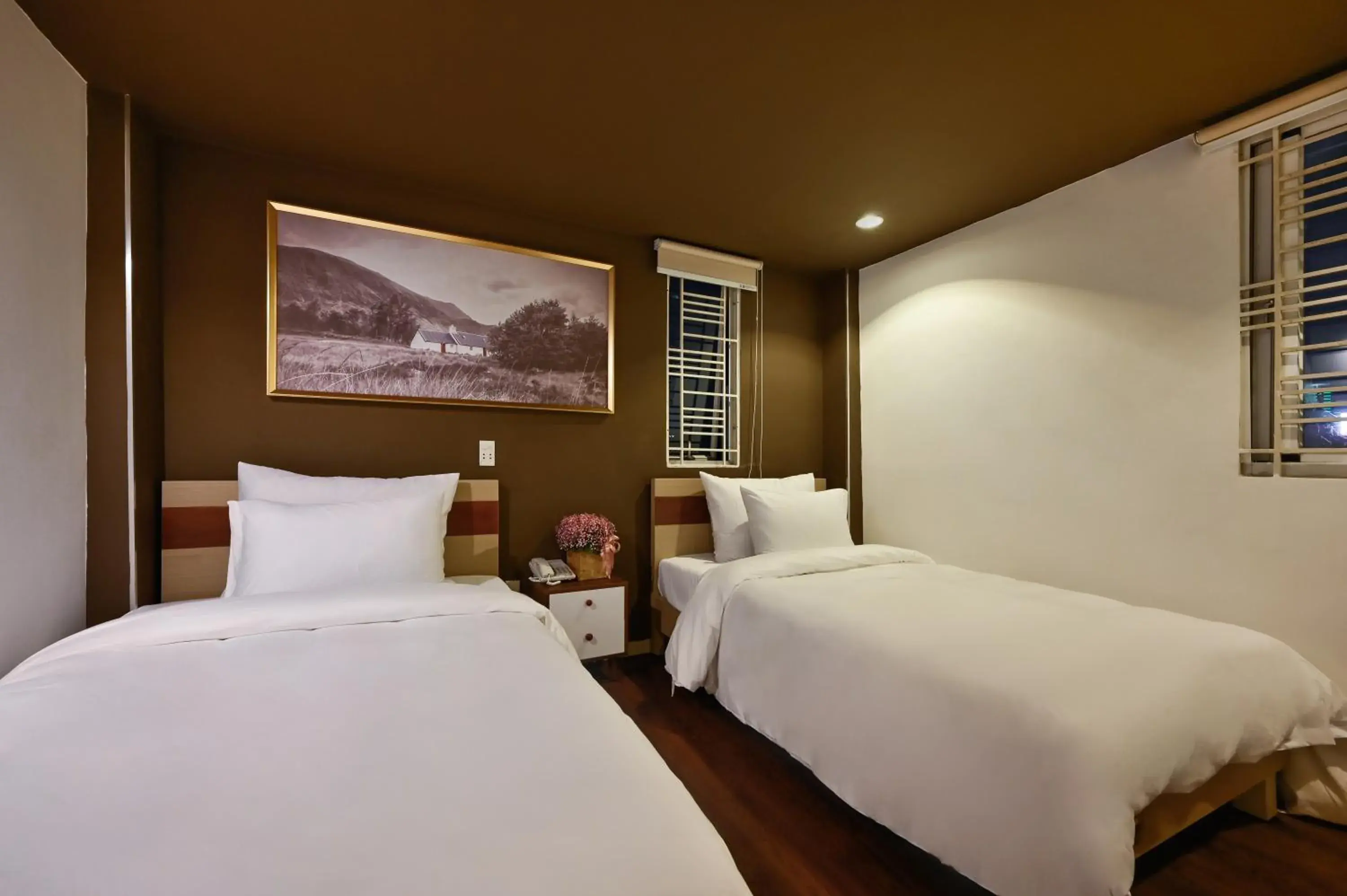 Bed in The Noble Swan Hotel New World Bed in The Noble Swan Hotel New World